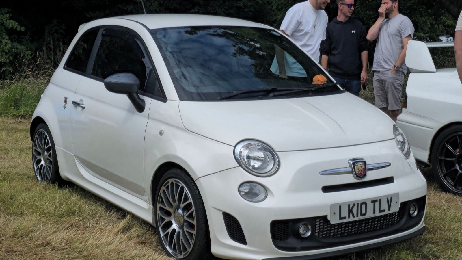 White 2010 Abarth 595, front three-quarter view