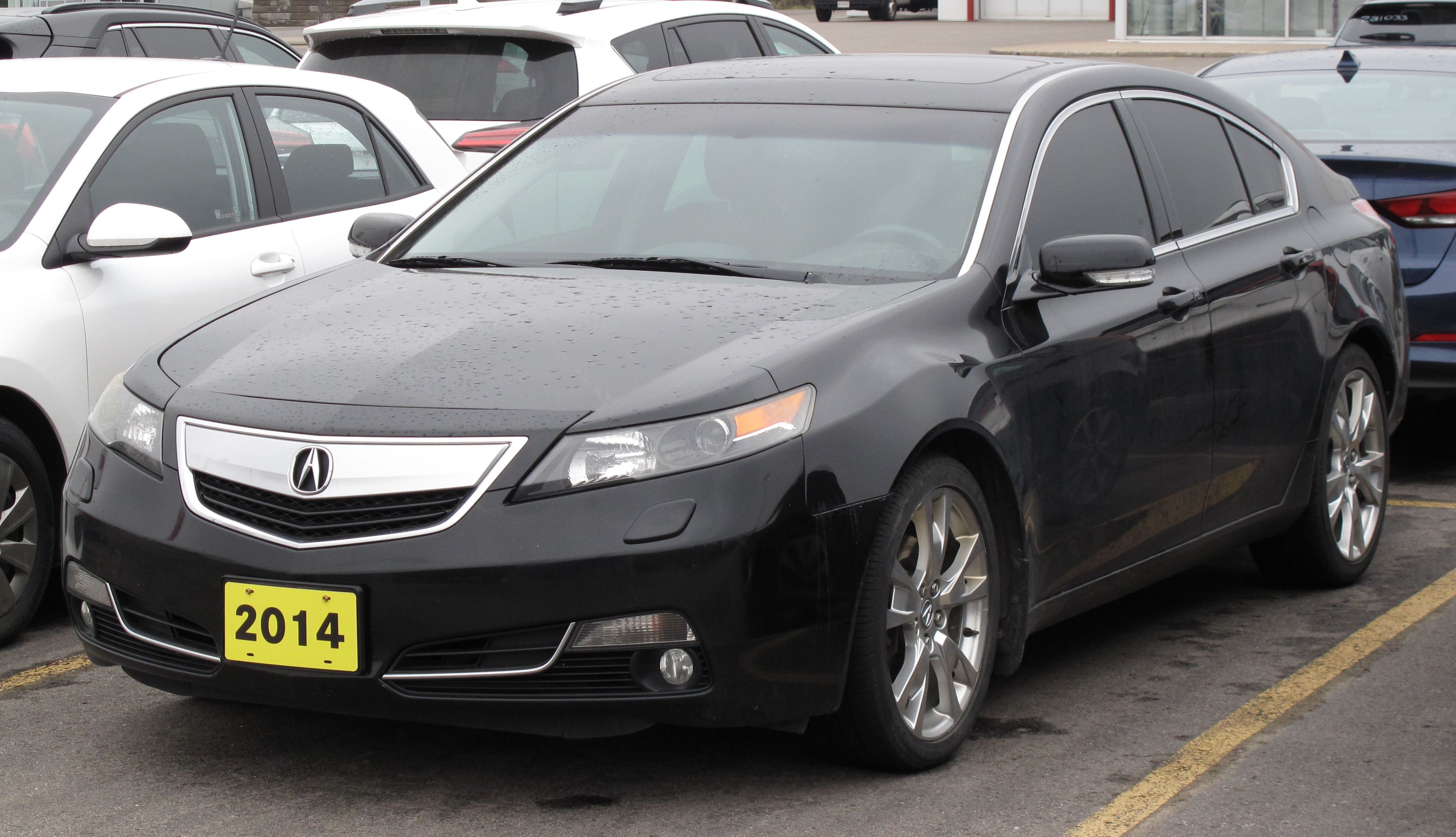 2014 Acura TL (fourth generation), front three-quarter view