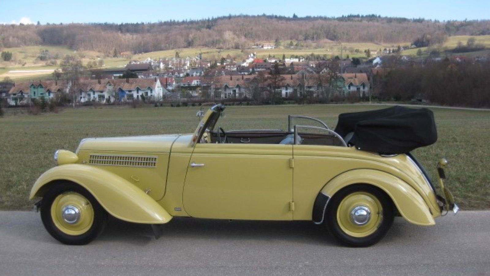 1937 Adler Trumpf 1.7 EV with Karmann coachwork, yellow, left side profile