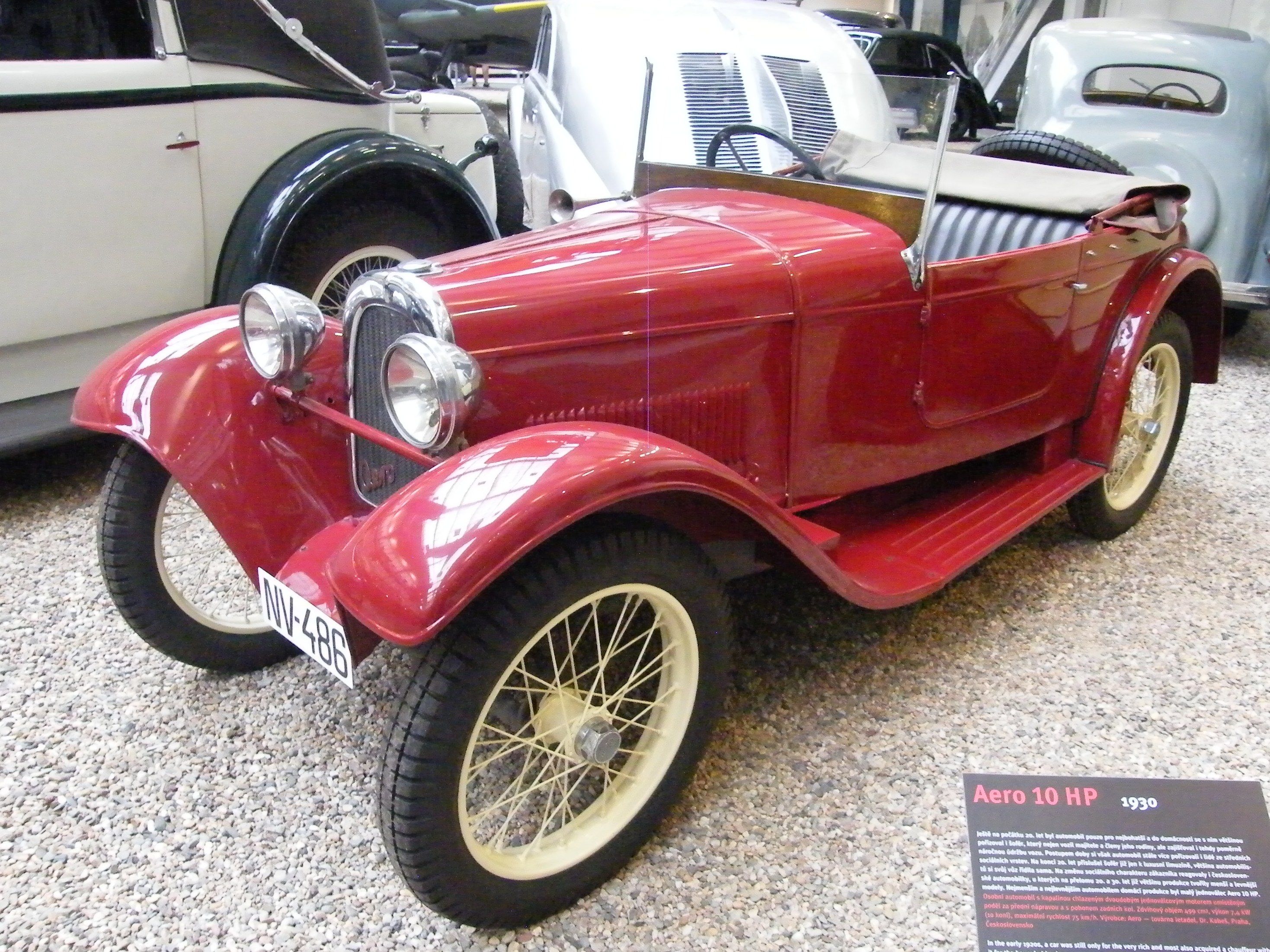 Red 1930 Aero 500 (Aero 10 HP) roadster, front three-quarter view