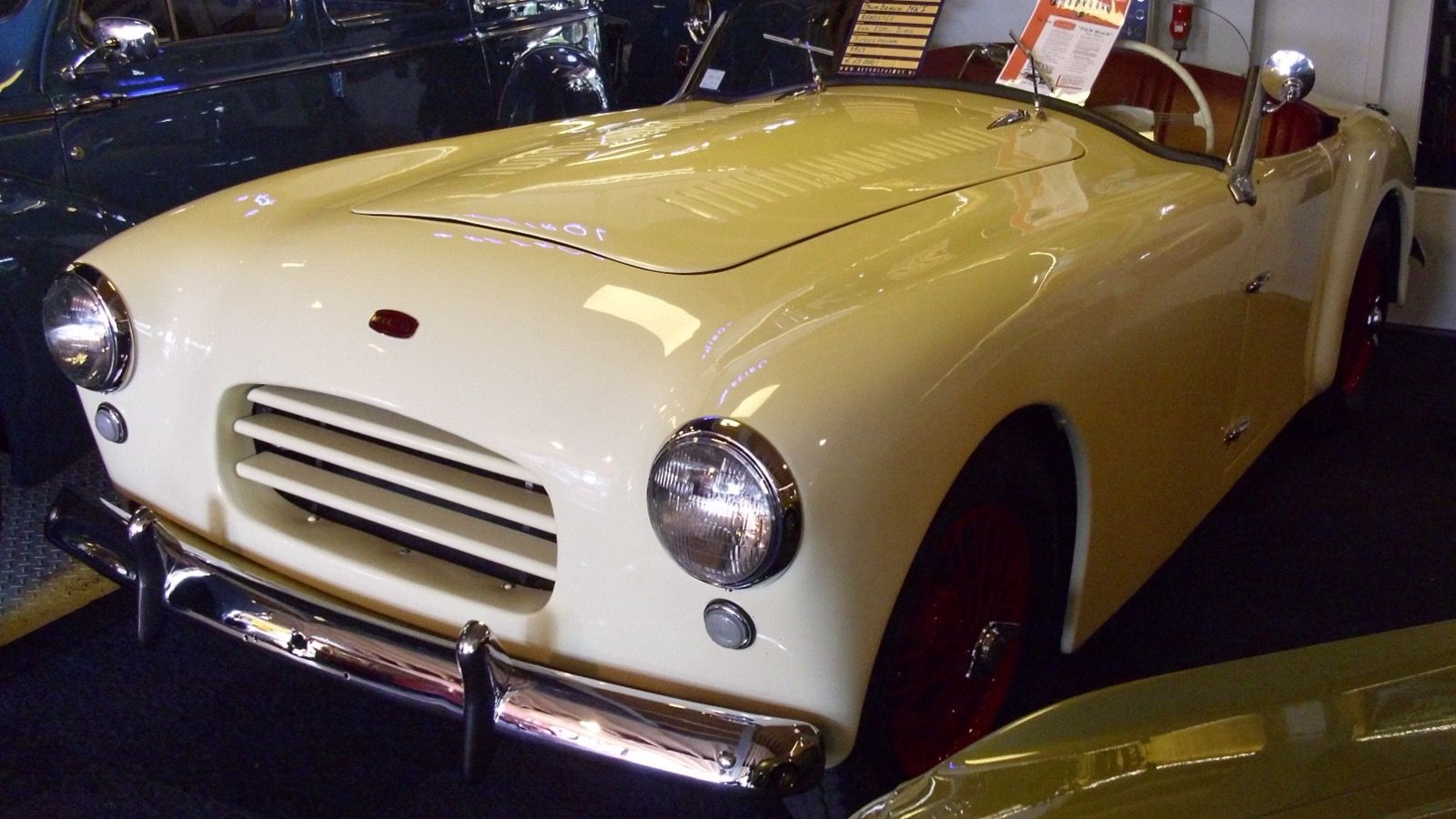Cream 1953 Allard Palm Beach Mk I roadster, front three-quarter view