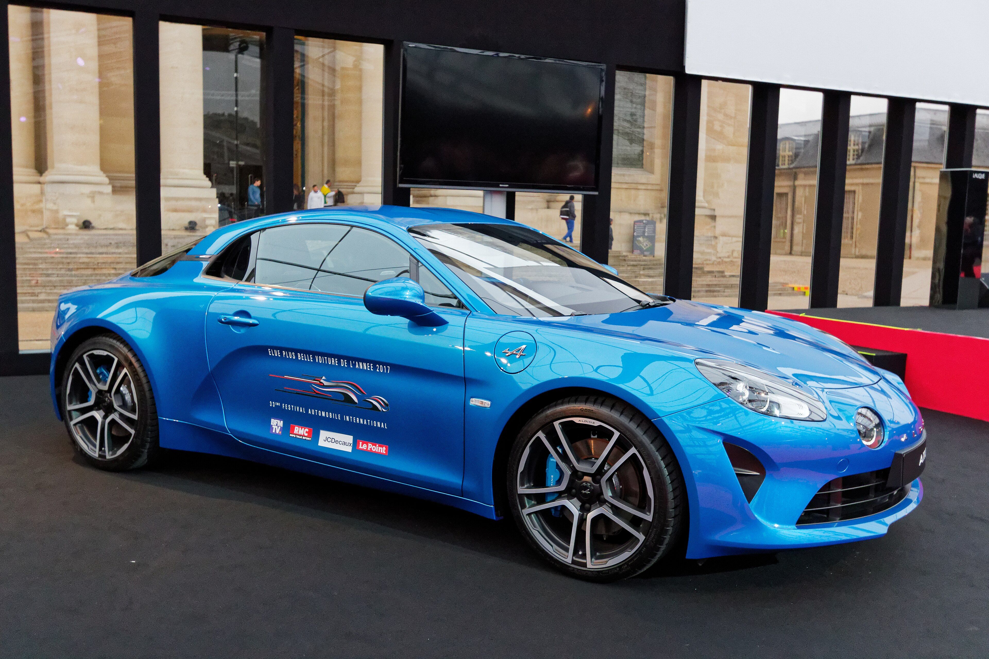 Blue 2018 Alpine A110 revival coupé, front three-quarter view
