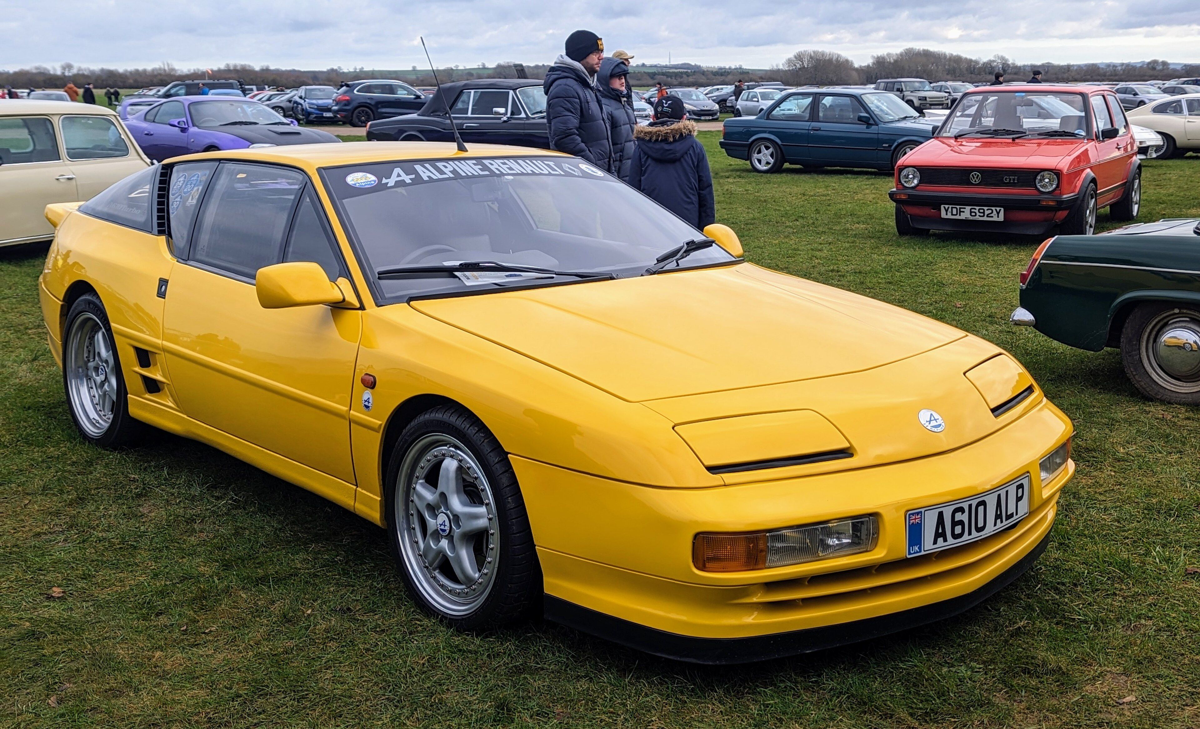 Yellow 1993 Alpine A610 Turbo, front three-quarter view