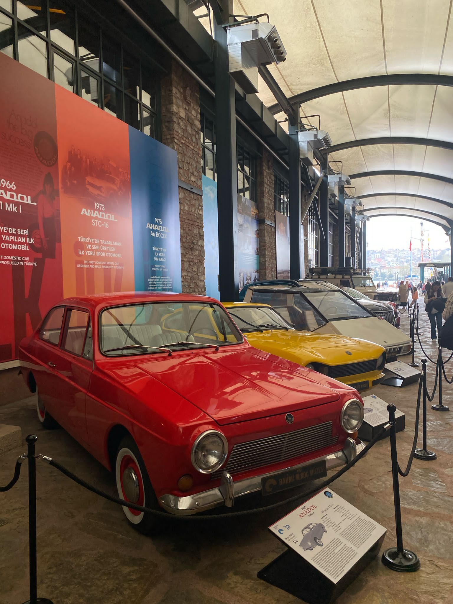 Red 1967 Anadol A1 two-door coupé on museum display, front three-quarter view