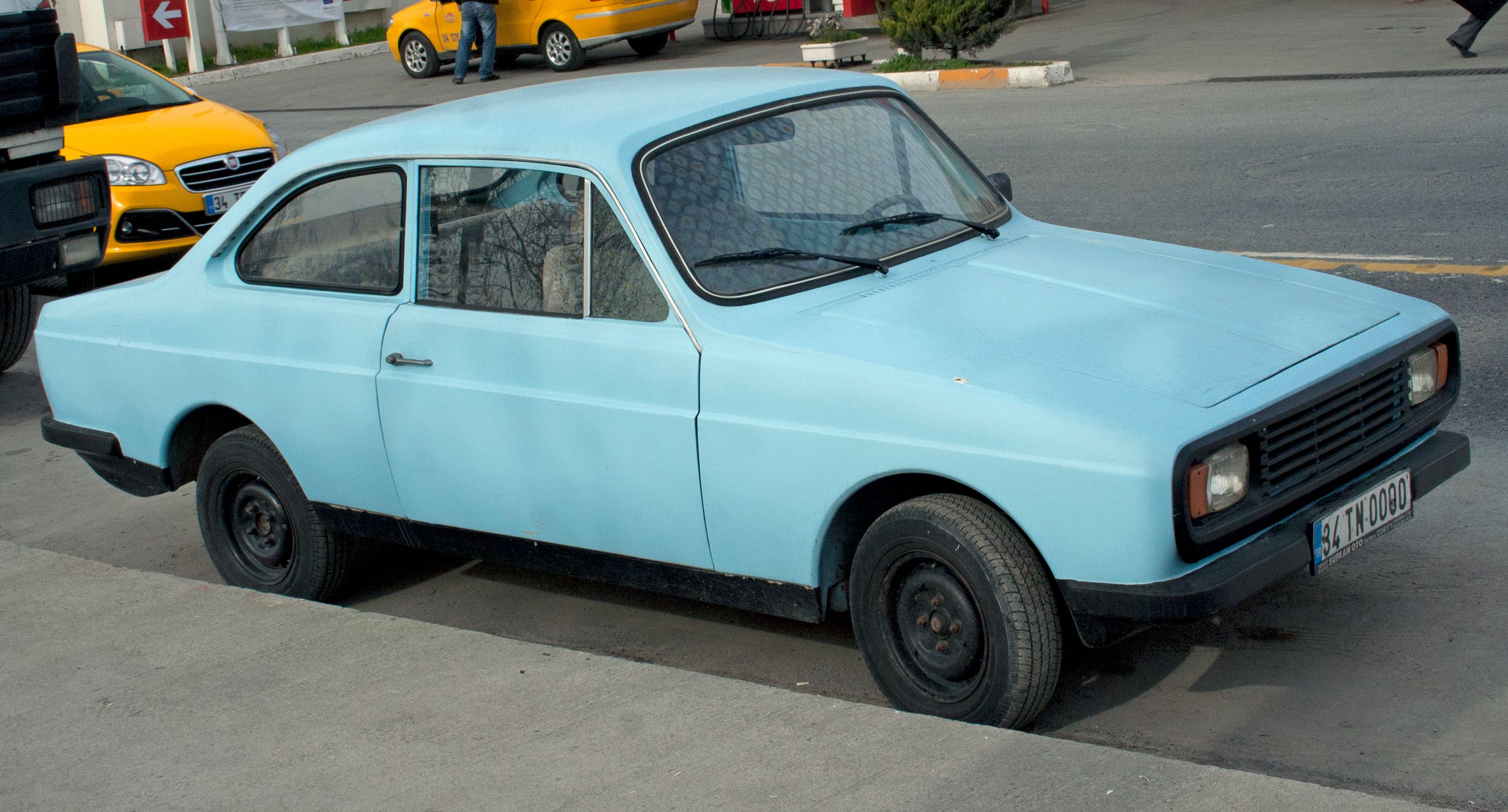 Light blue 1972 Anadol A1 two-door coupé, front three-quarter view