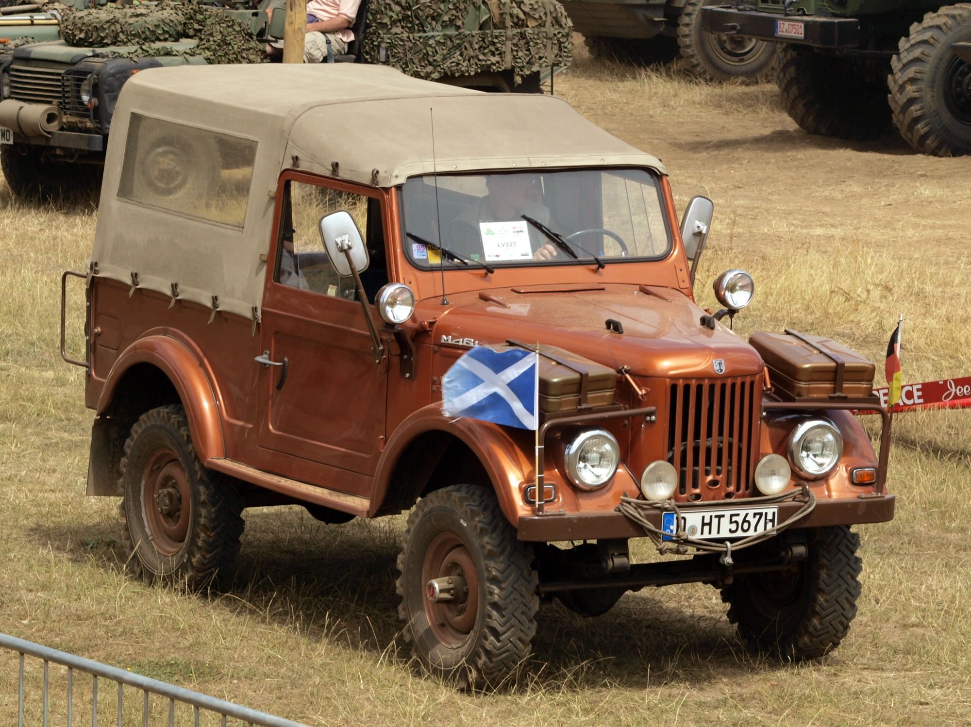 ARO M461 canvas-top utility 4x4 in copper brown, front three-quarter view