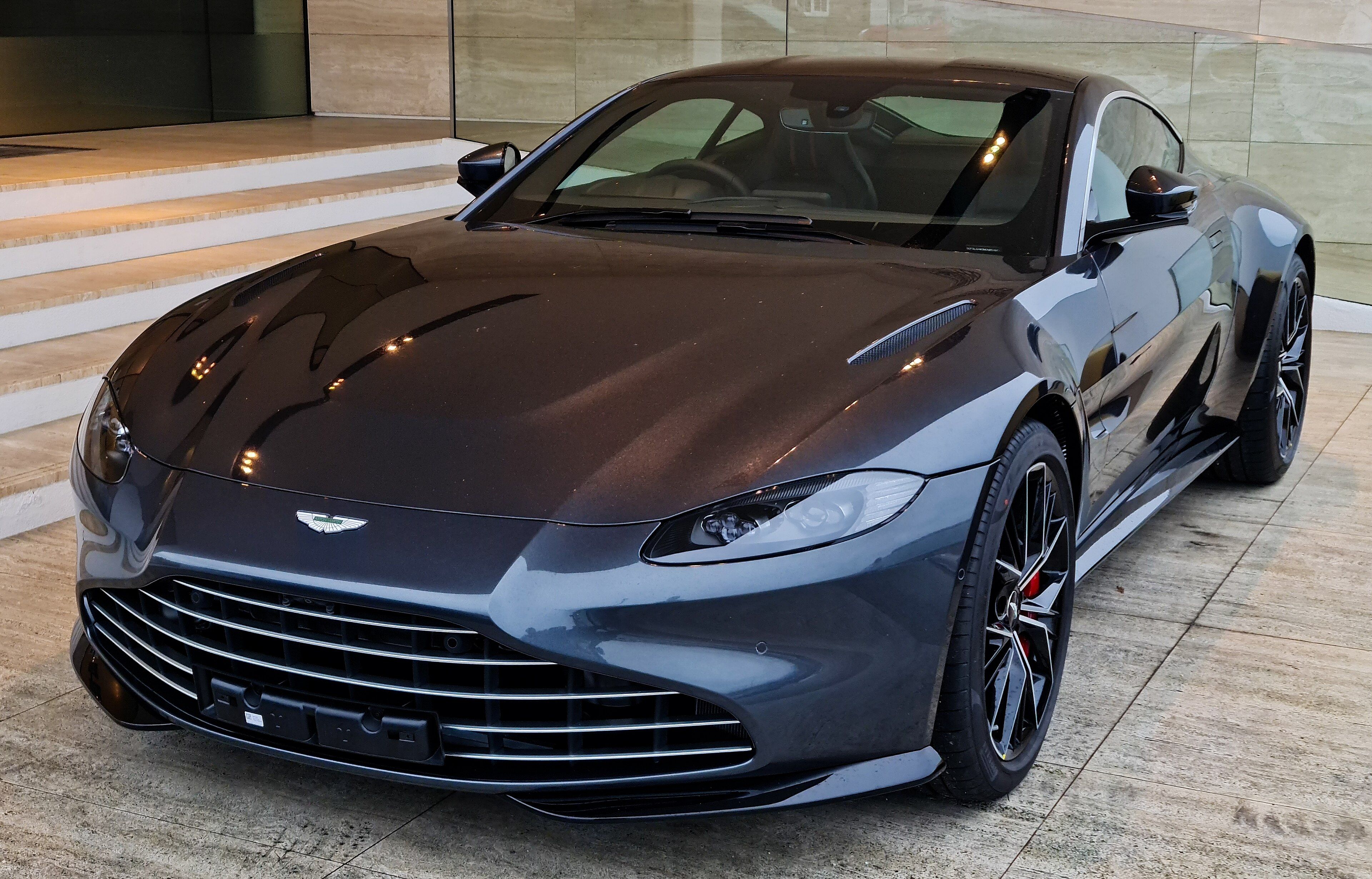 2020 Aston Martin Vantage coupe with vaned grille, front three-quarter view