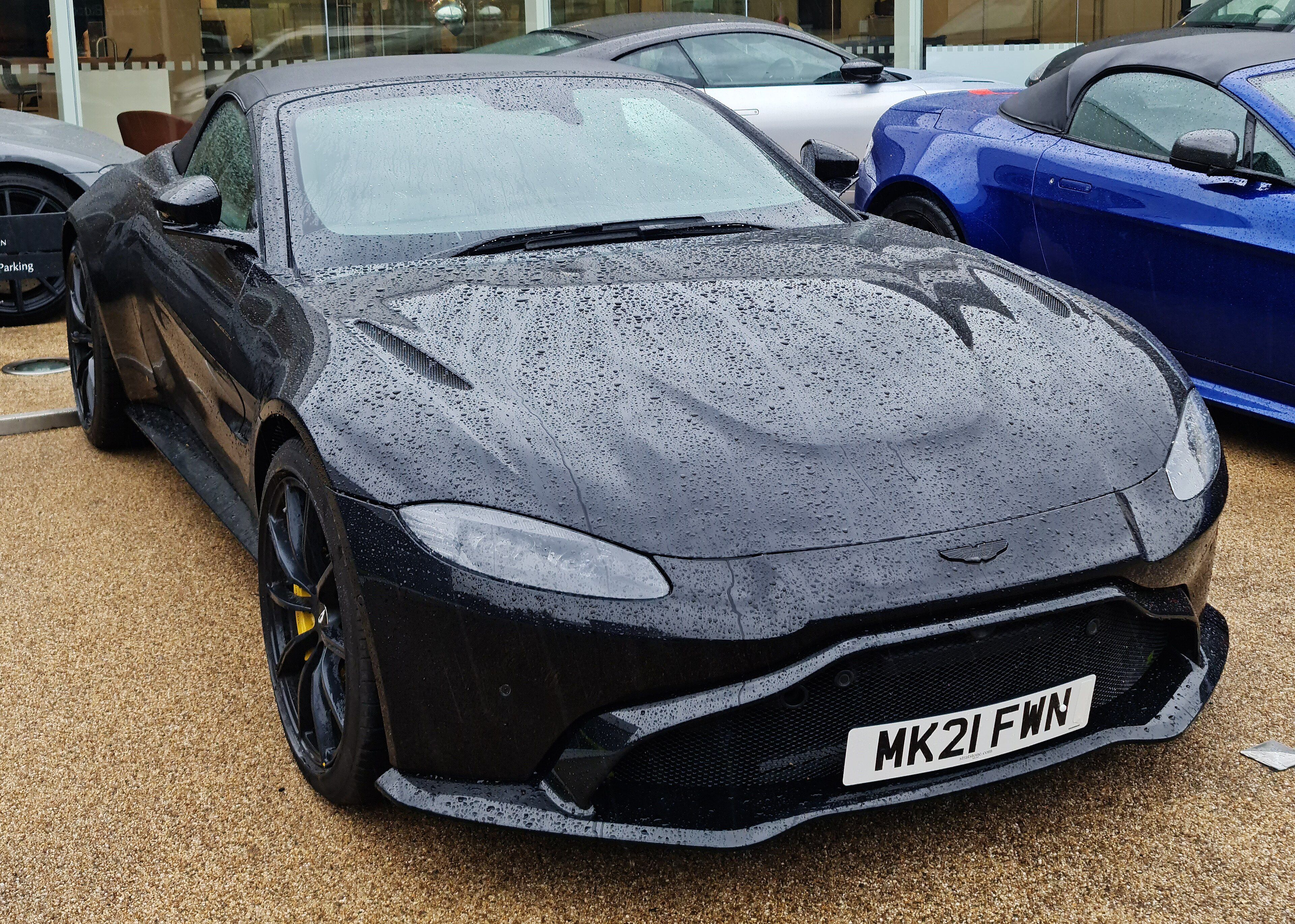 2021 Aston Martin Vantage Roadster in black, front three-quarter view