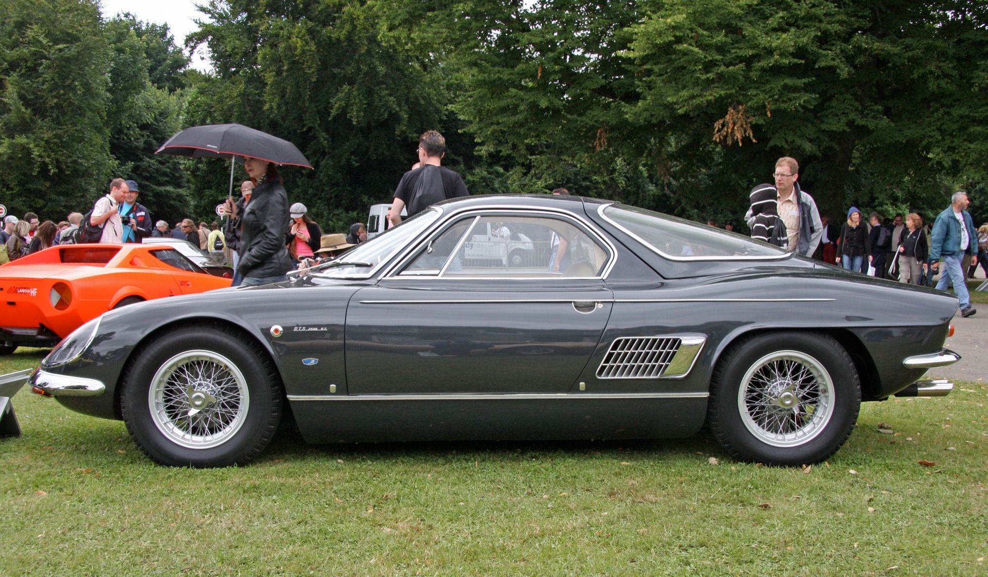 Dark 1963 ATS 2500 GT coupe, front three-quarter view