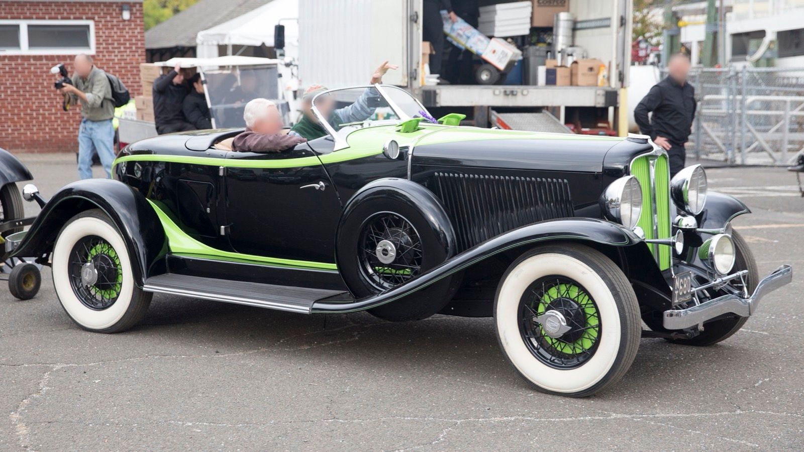 1932 Auburn 8-100 boat-tail Speedster in black and green, front right side view