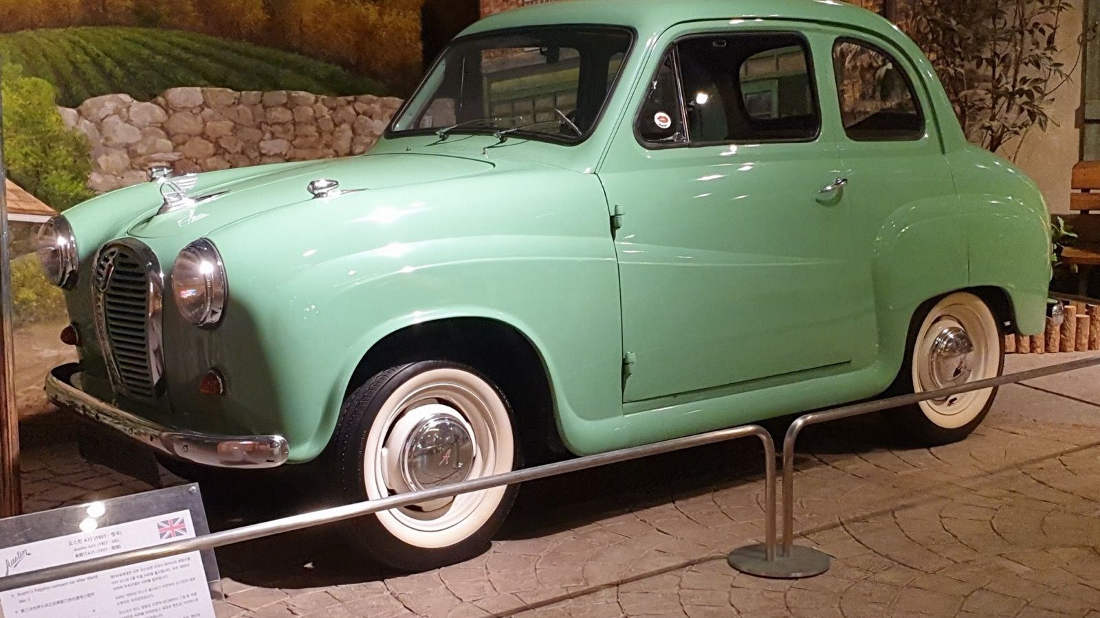 Green 1957 Austin A35 saloon, front three-quarter view