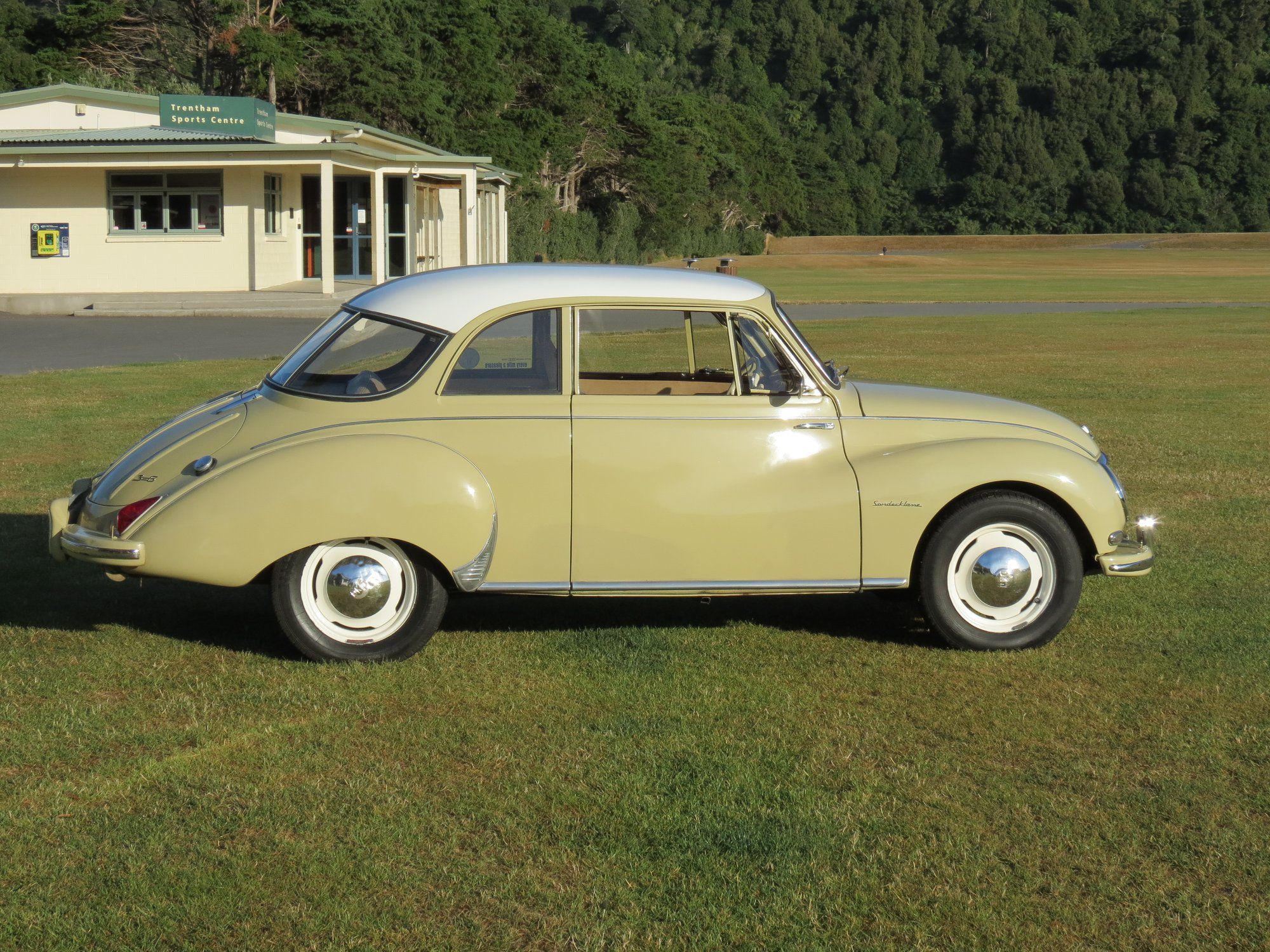 Two-tone 1957 DKW 3=6 Sonderklasse sedan, left side profile