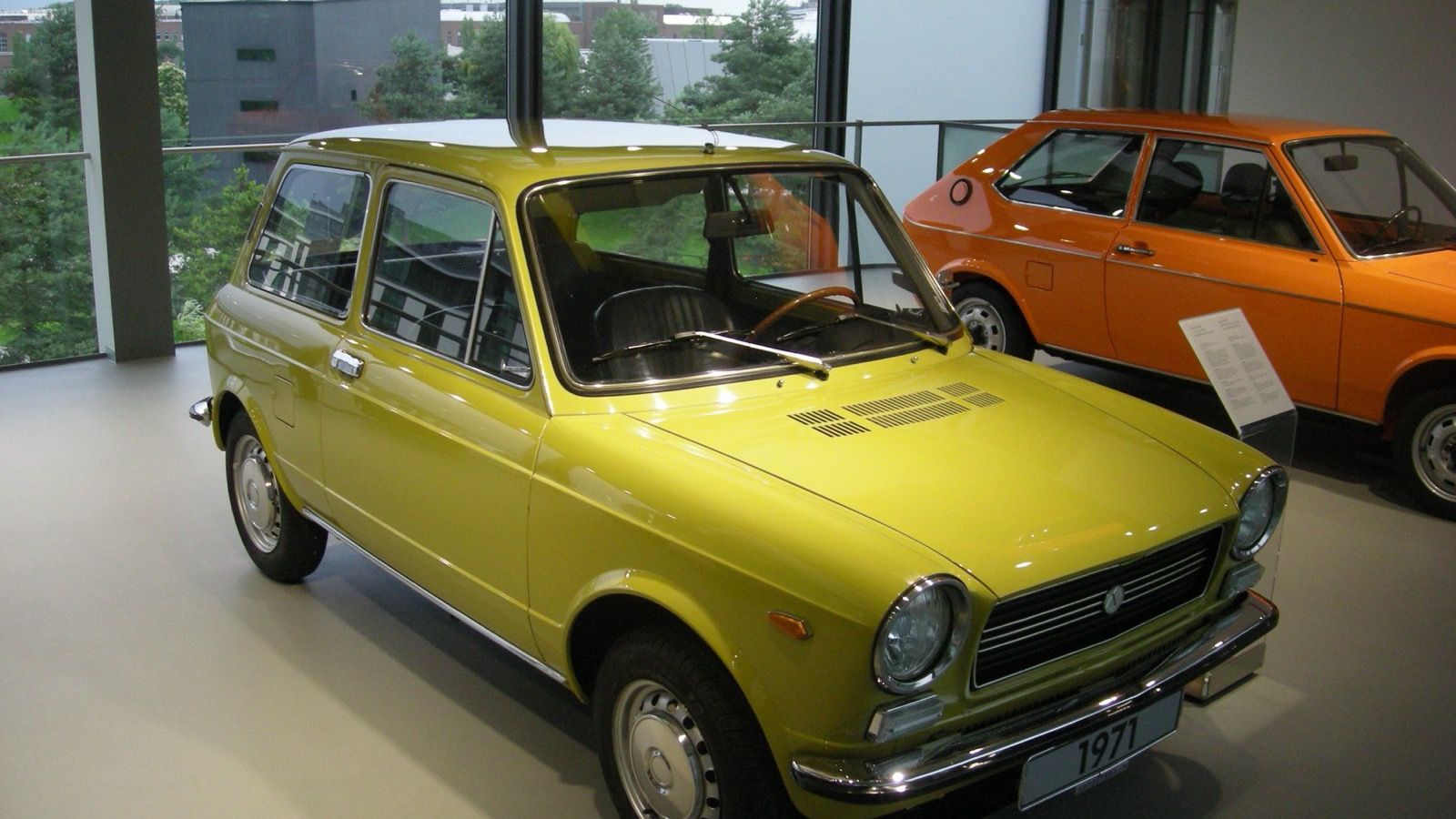 1971 Autobianchi A112 in yellow, front three-quarter view