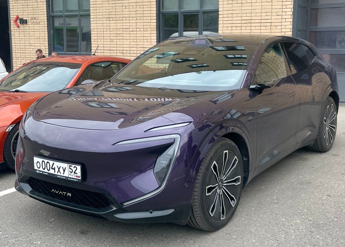 Purple 2024 Avatr 07 mid-size electric SUV, front three-quarter view