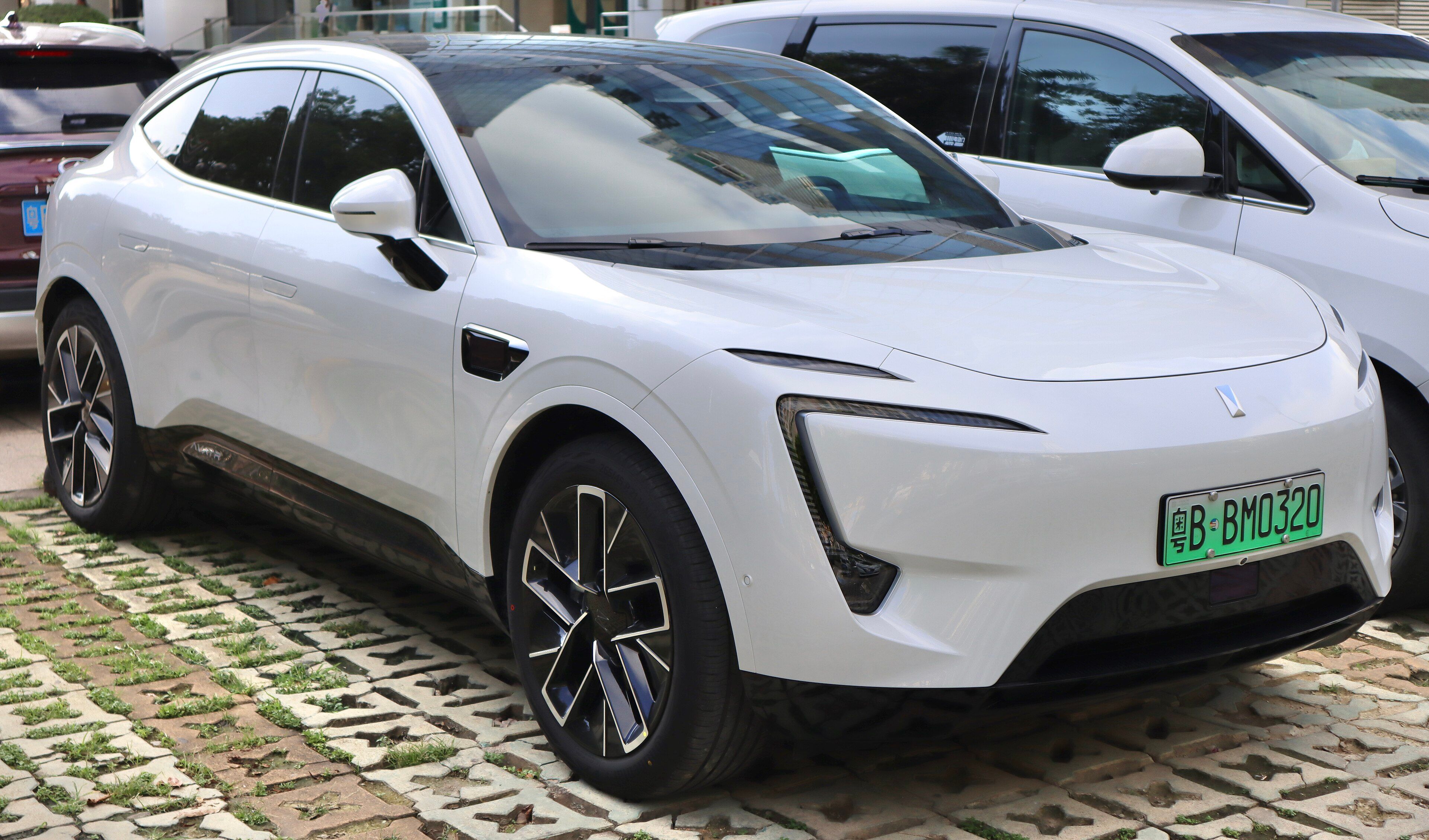 White 2022 Avatr 11 electric fastback SUV, front three-quarter view