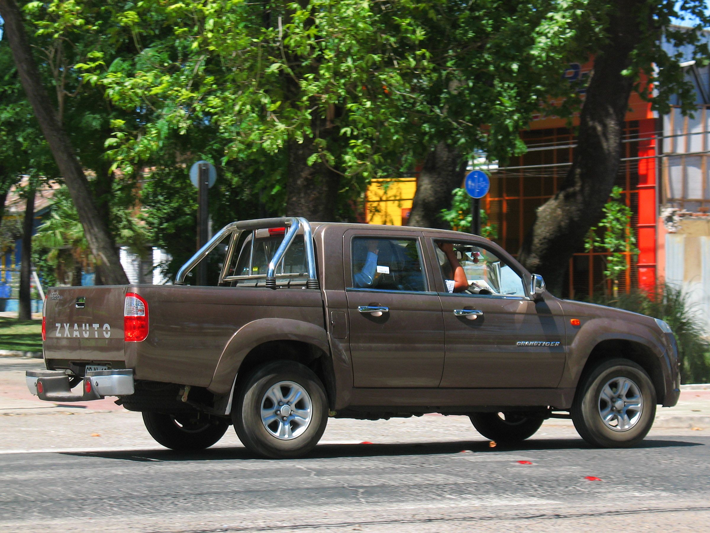 Brown 2013 ZX Auto Grand Tiger 2.2 Plus crew-cab pickup, side profile
