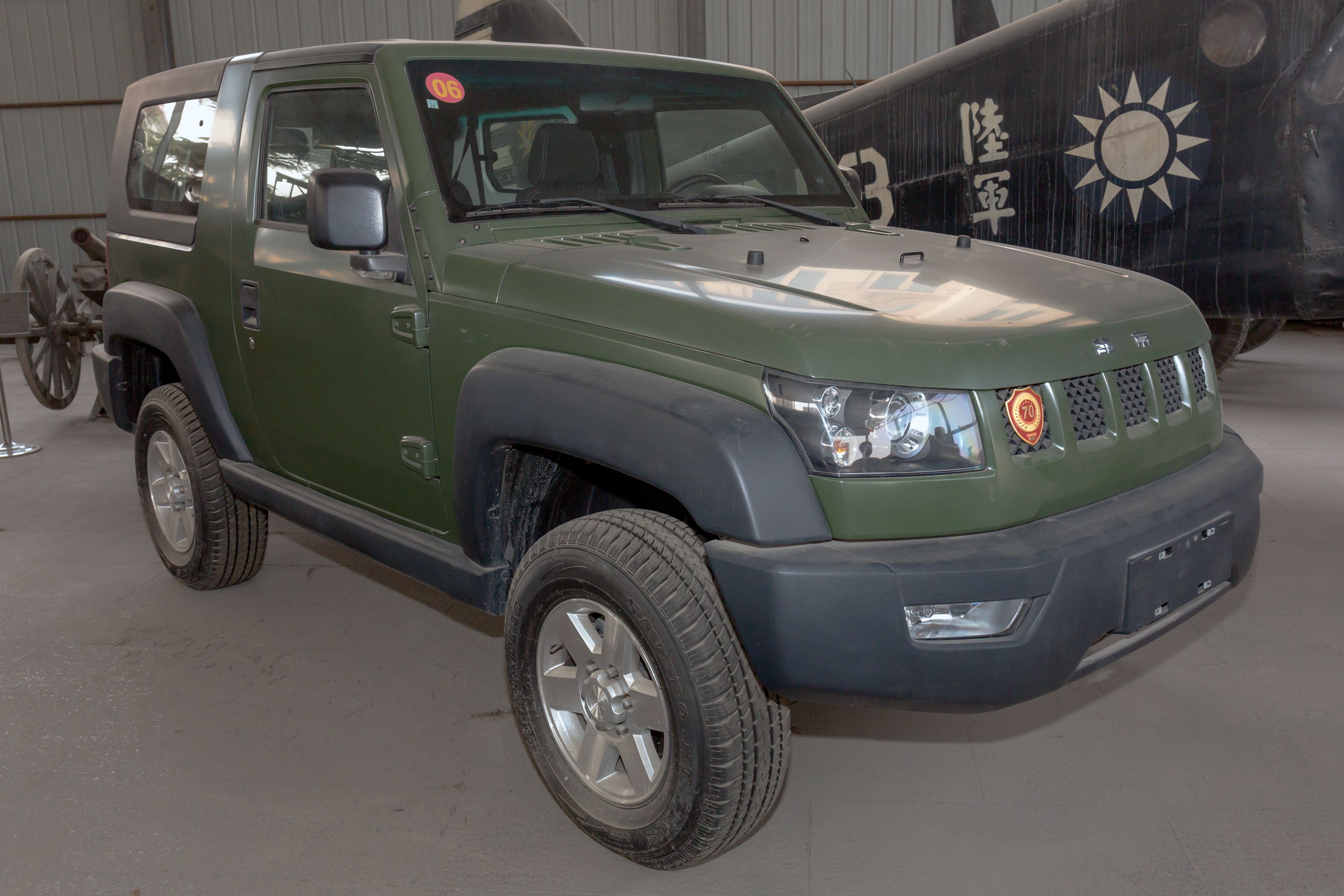 Army-green two-door 2016 BAIC Beijing BJ40, front three-quarter view