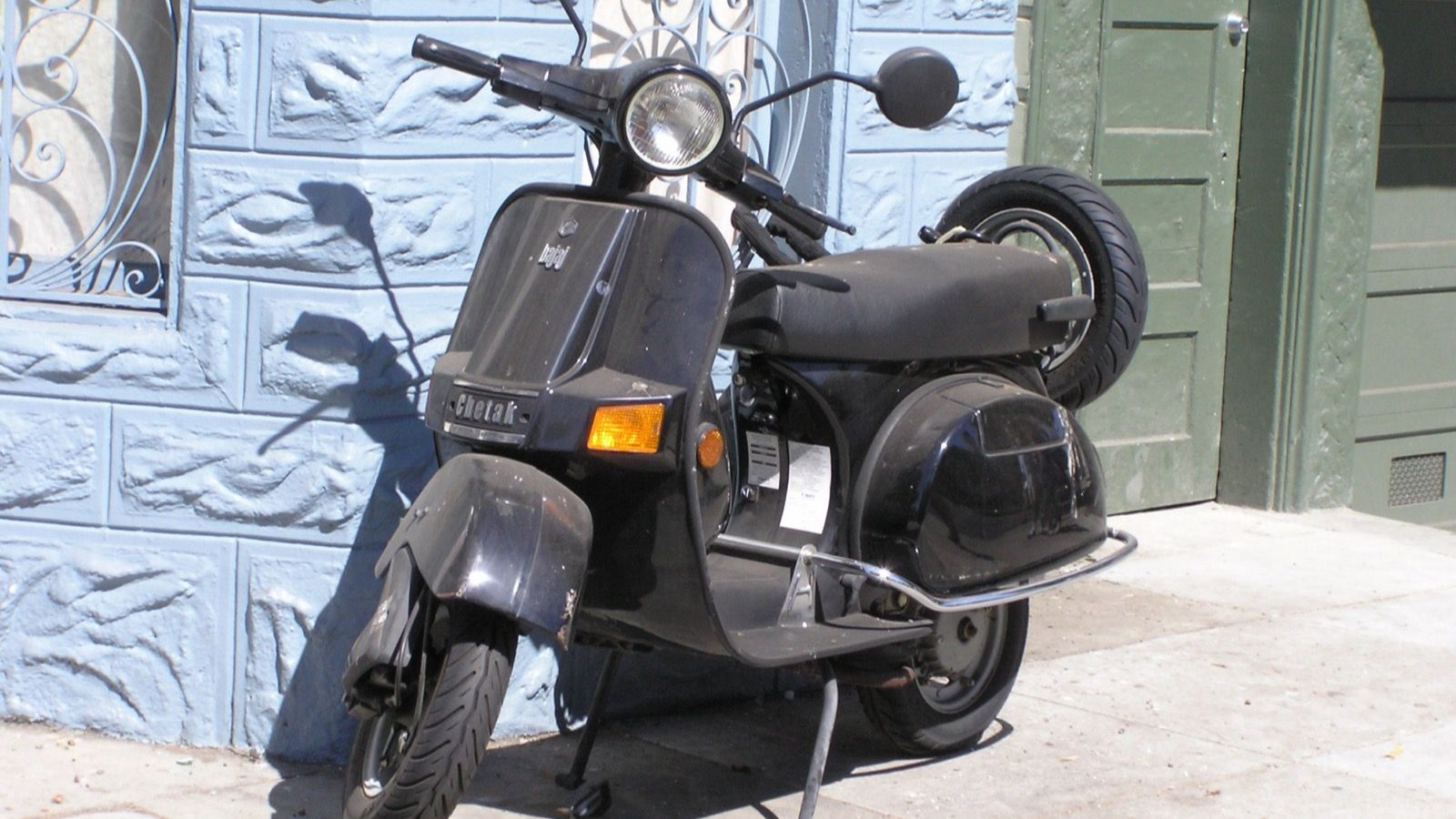 Blue Bajaj Chetak step-through scooter, front three-quarter view