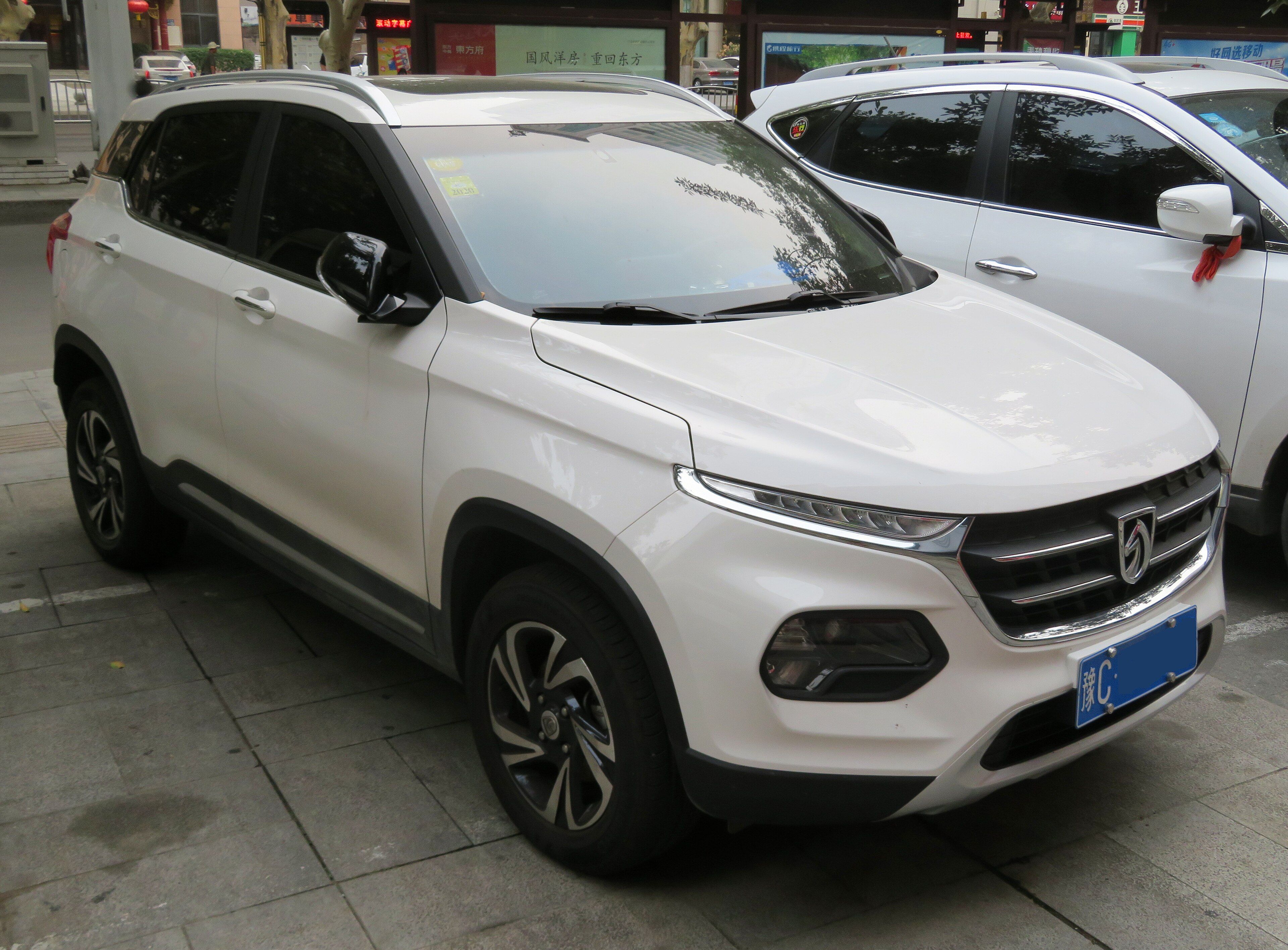 White Baojun 510 subcompact SUV, front three-quarter view