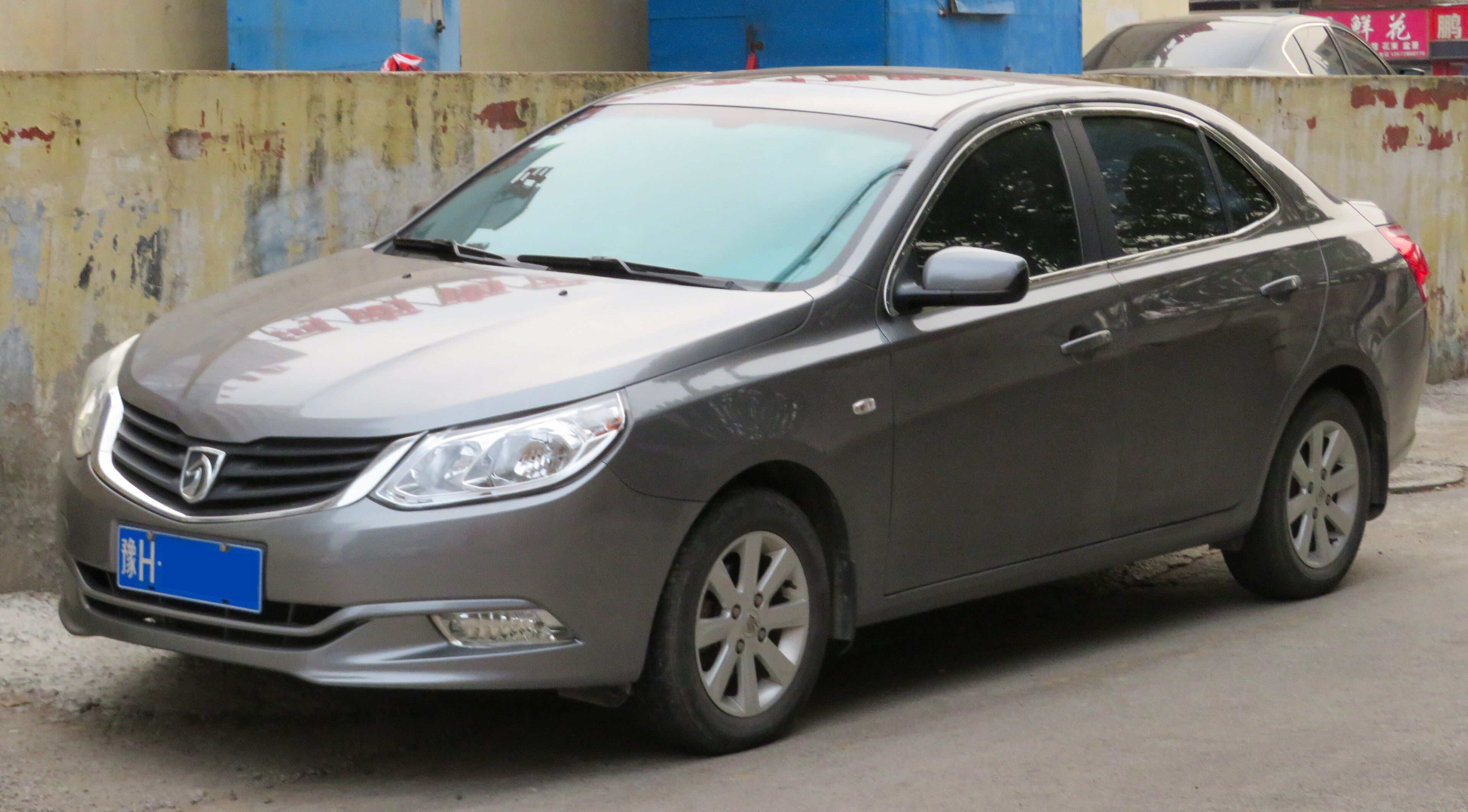 Grey Baojun 630 compact sedan, front three-quarter view