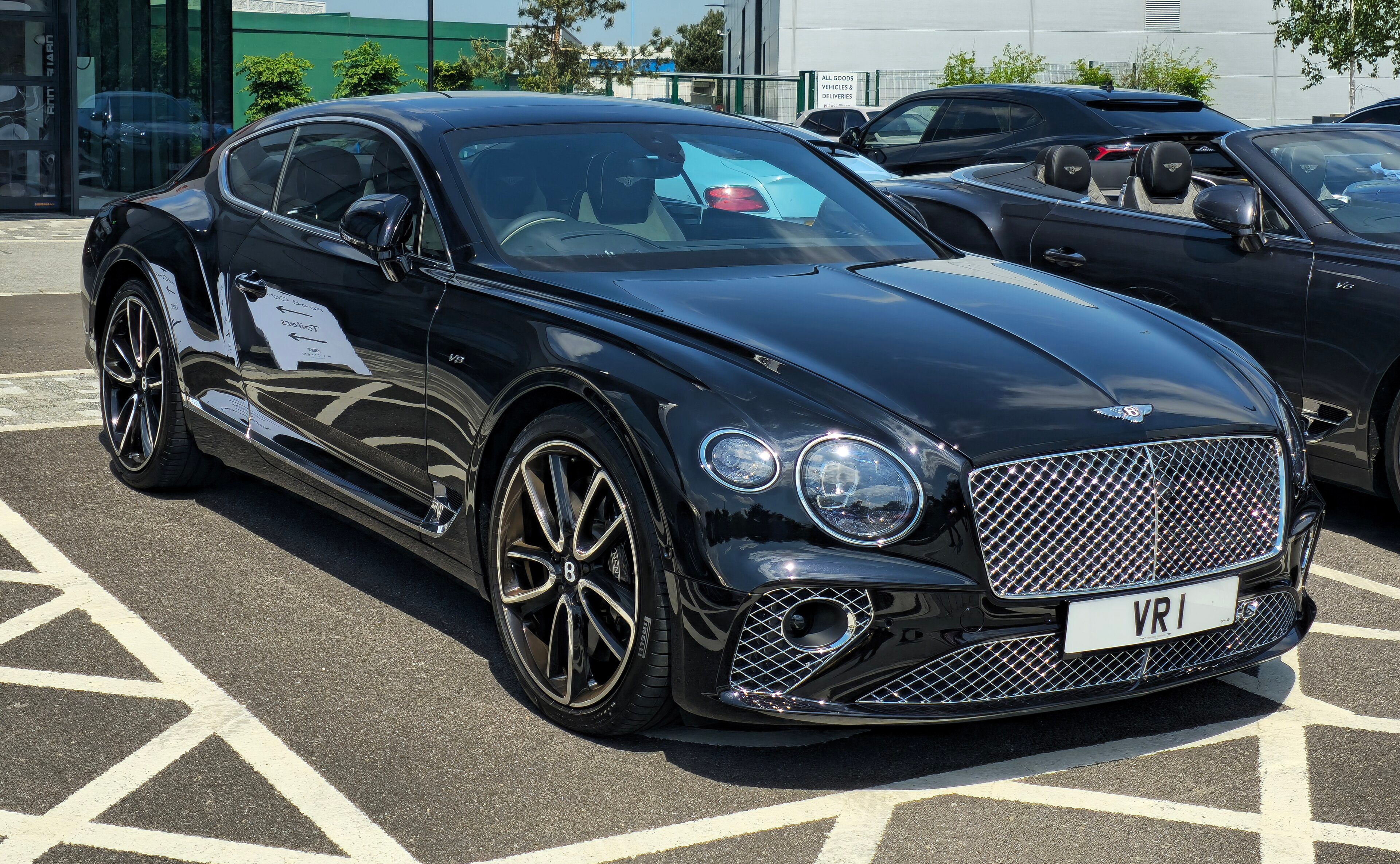 Black 2022 Bentley Continental GT V8 coupe, front three-quarter view
