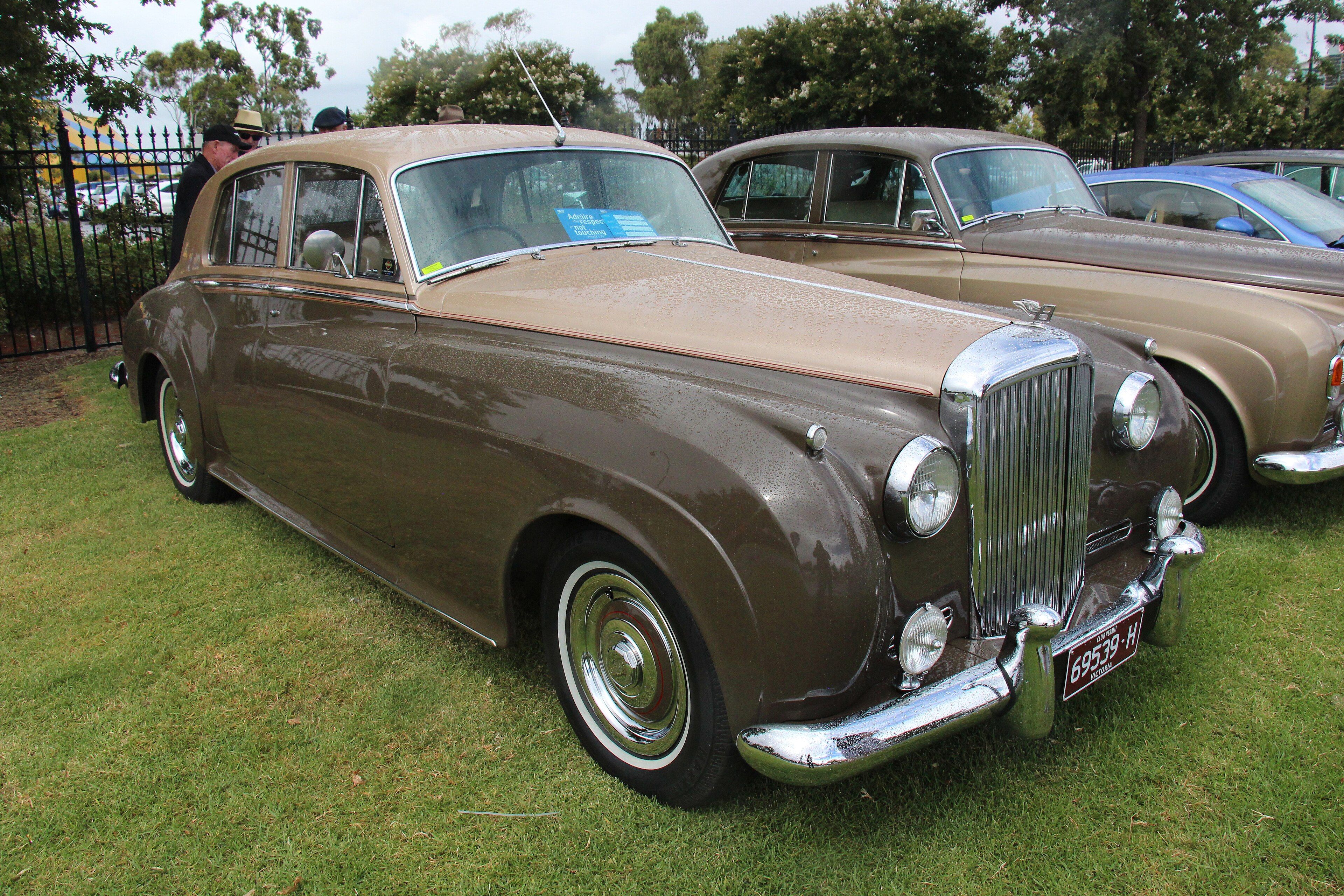 Two-tone brown 1955 Bentley S1 standard saloon, front three-quarter view