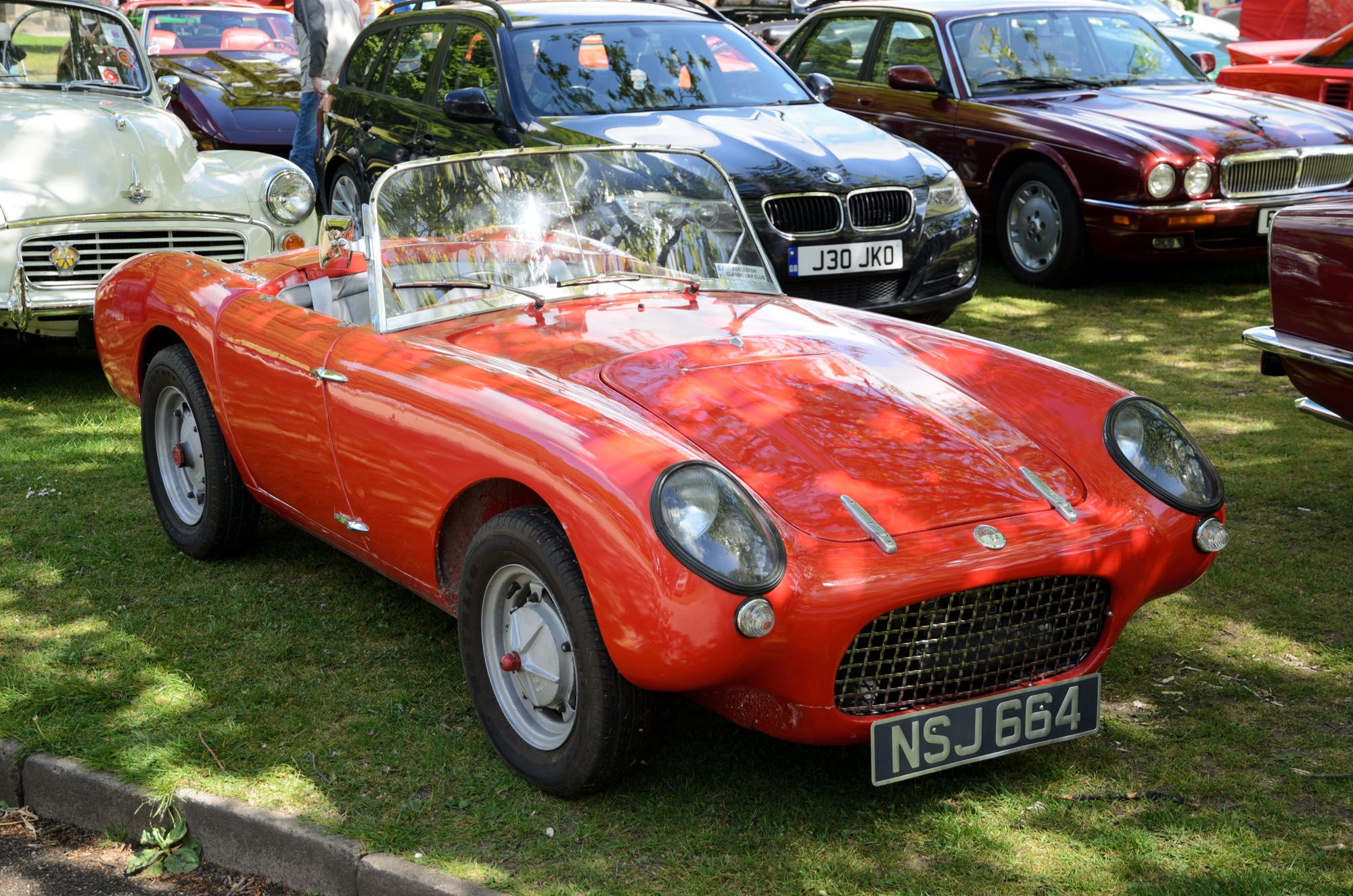 Red 1958 Berkeley Sports SE328 roadster, front three-quarter view