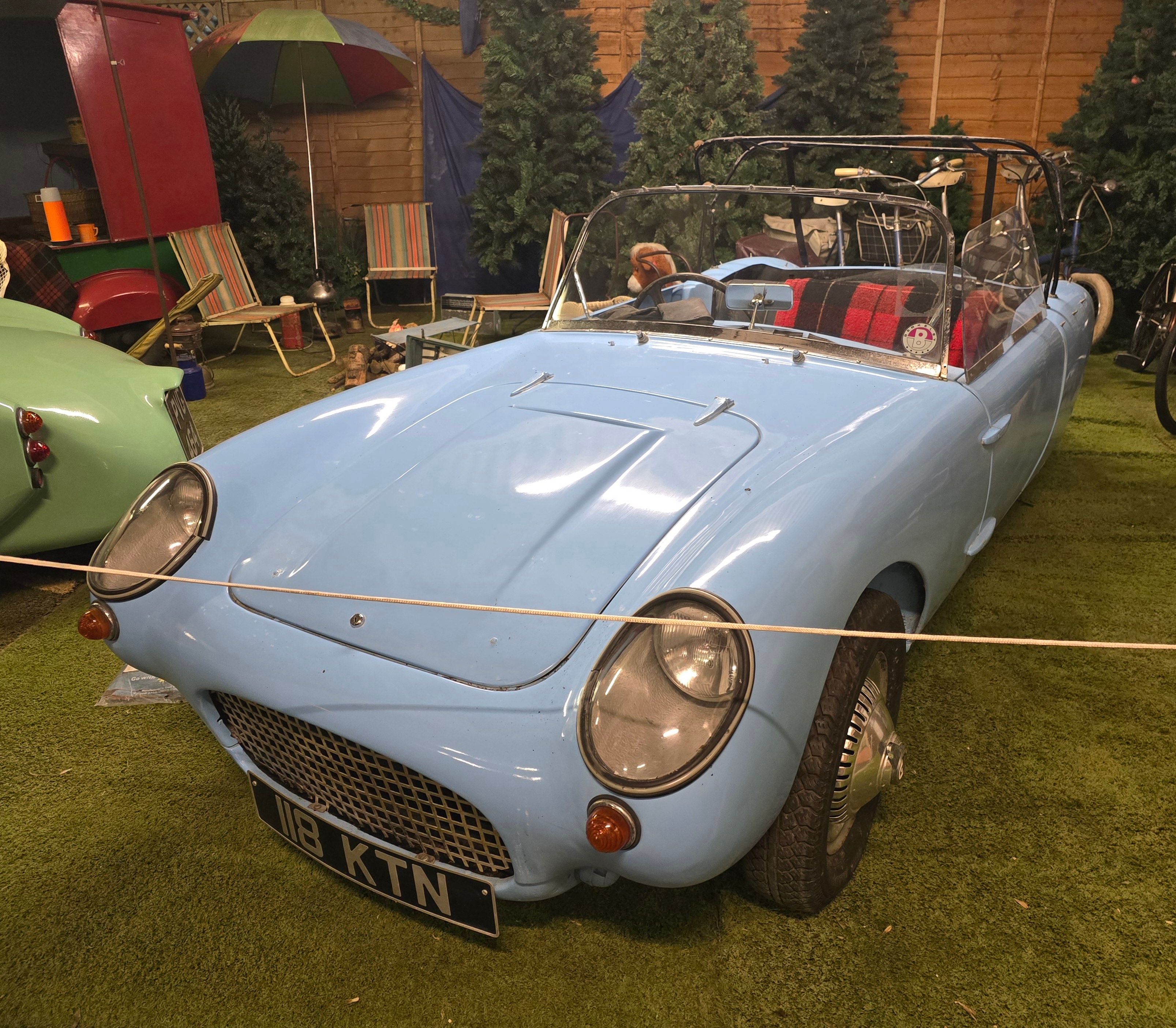 Light blue 1960 Berkeley T60 three-wheeler roadster, front three-quarter view