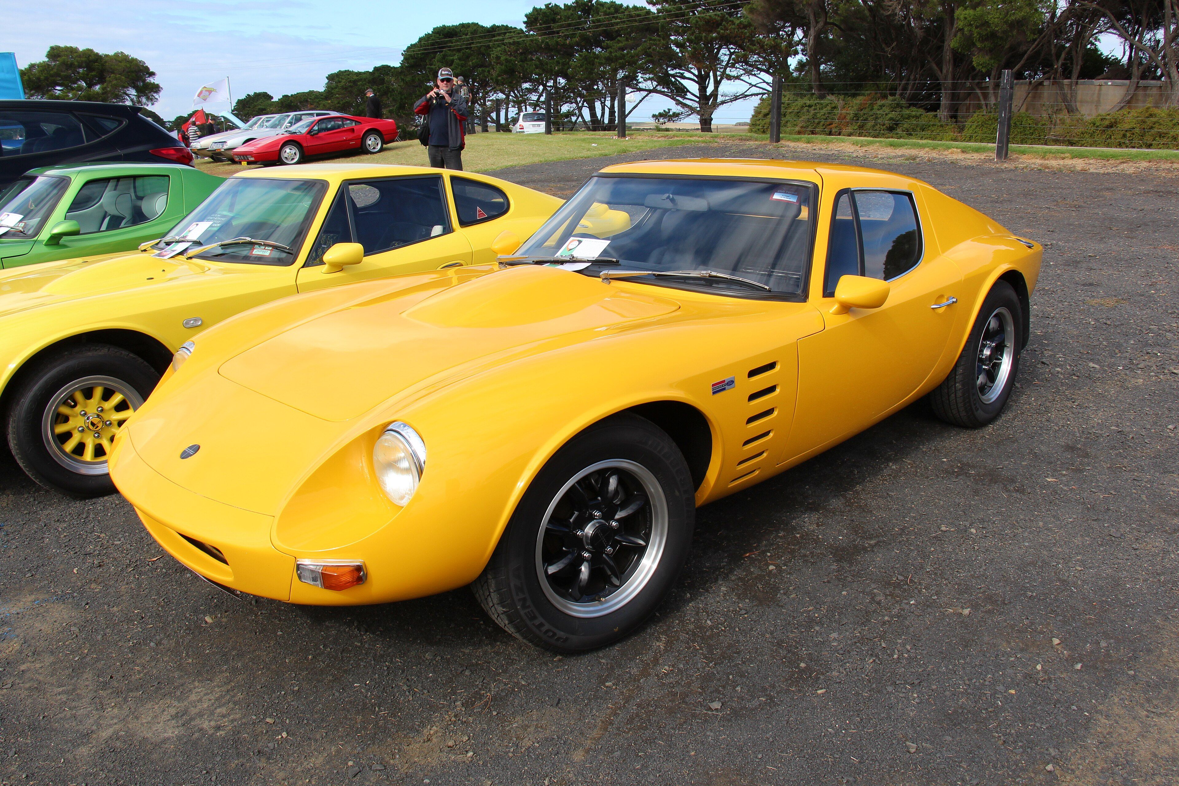 Yellow 1972 Bolwell Nagari Mk VIII coupe, front three-quarter view