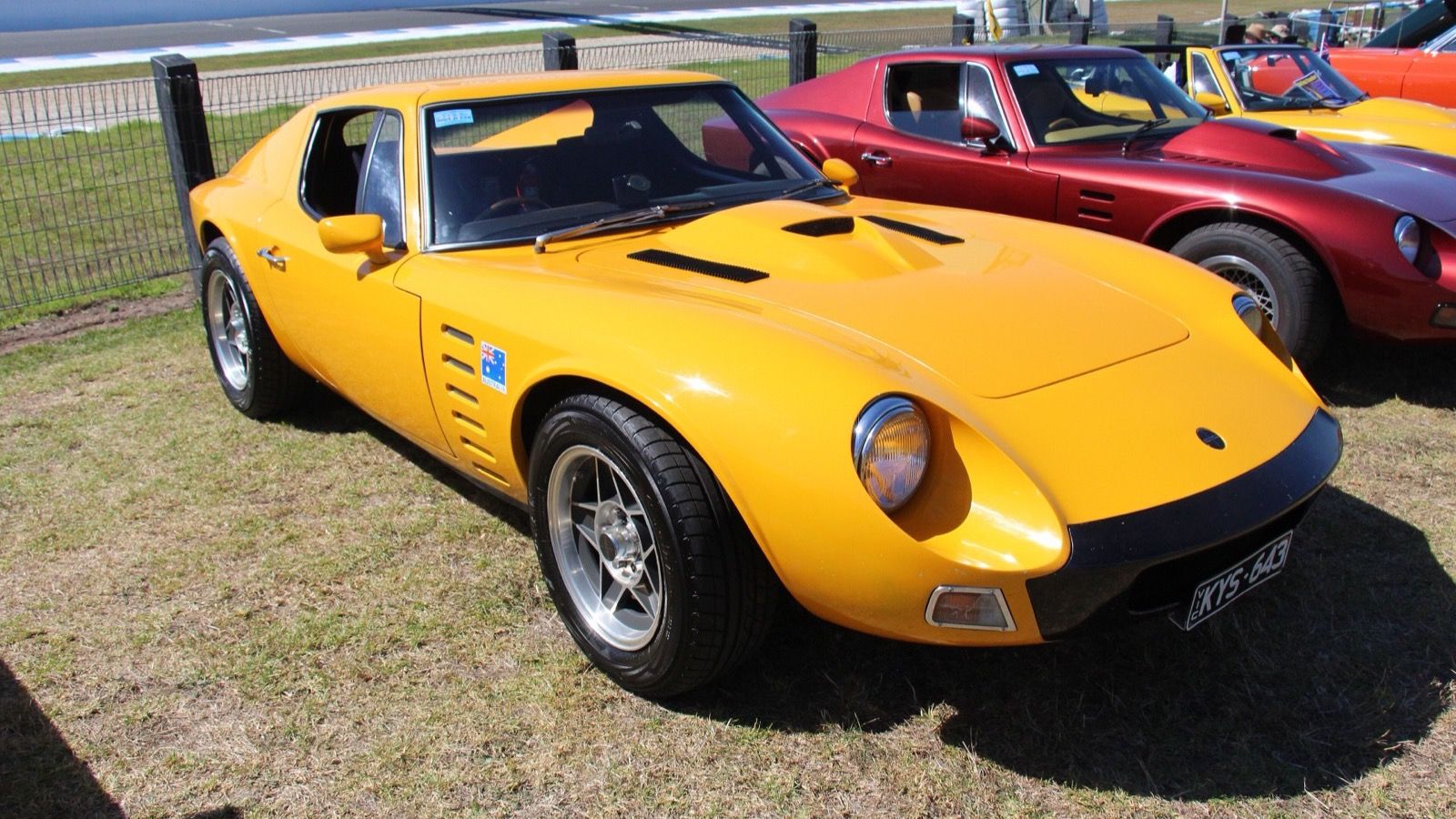 Yellow 1970 Bolwell Nagari Mk VIII coupe, front three-quarter view