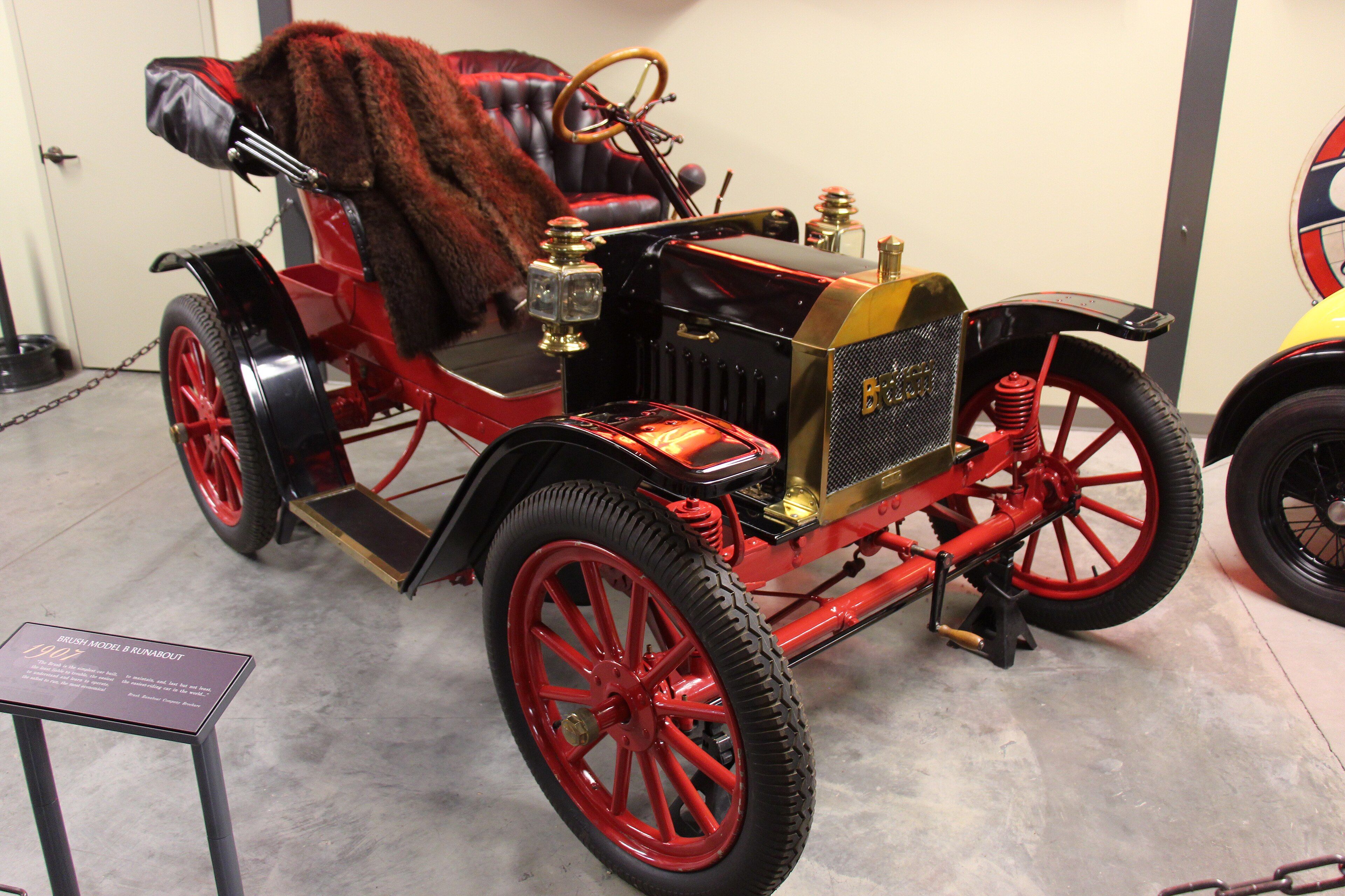 Red 1907 Brush Model B Runabout with brass radiator, front three-quarter view