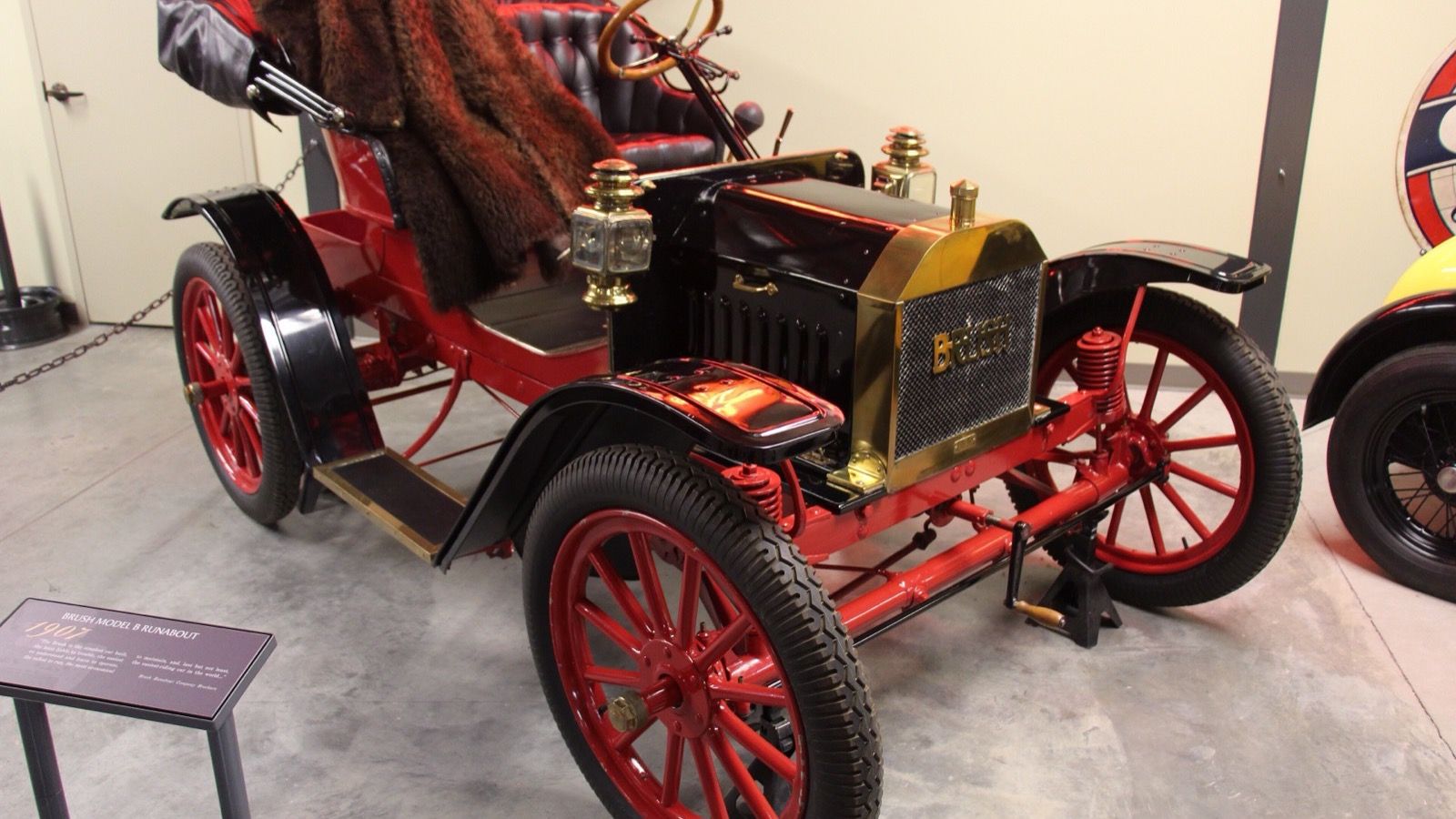 Red 1907 Brush Model B Runabout with brass radiator, front three-quarter view