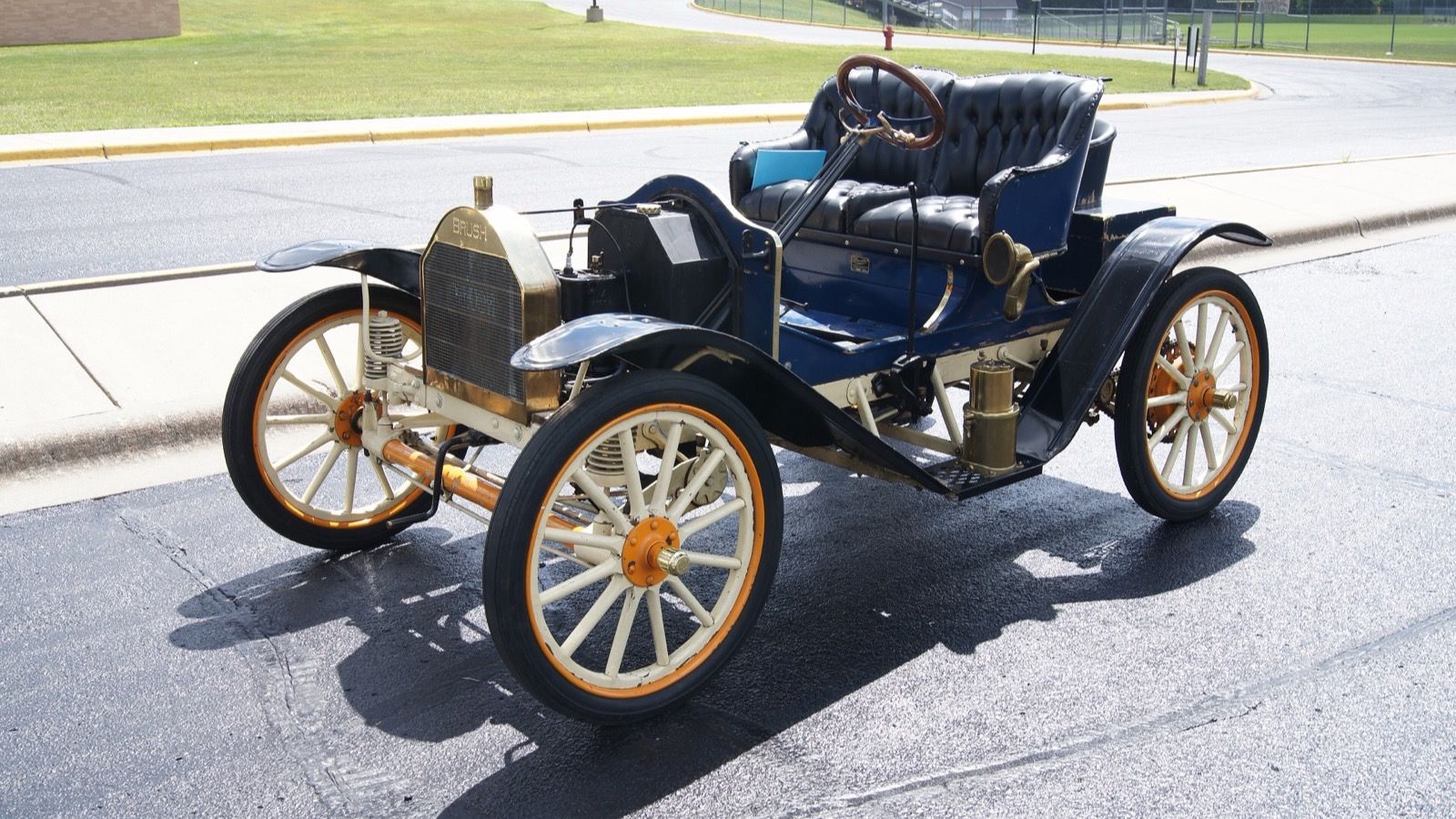 Blue 1911 Brush E28 Runabout with brass radiator, front three-quarter view