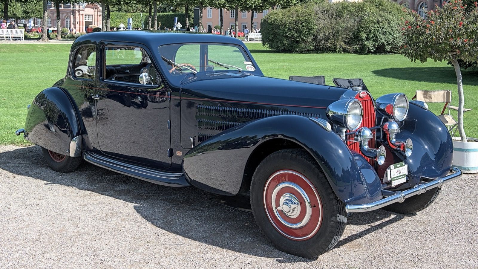 Dark blue 1936 Bugatti Type 57 Gangloff coupe, front three-quarter view