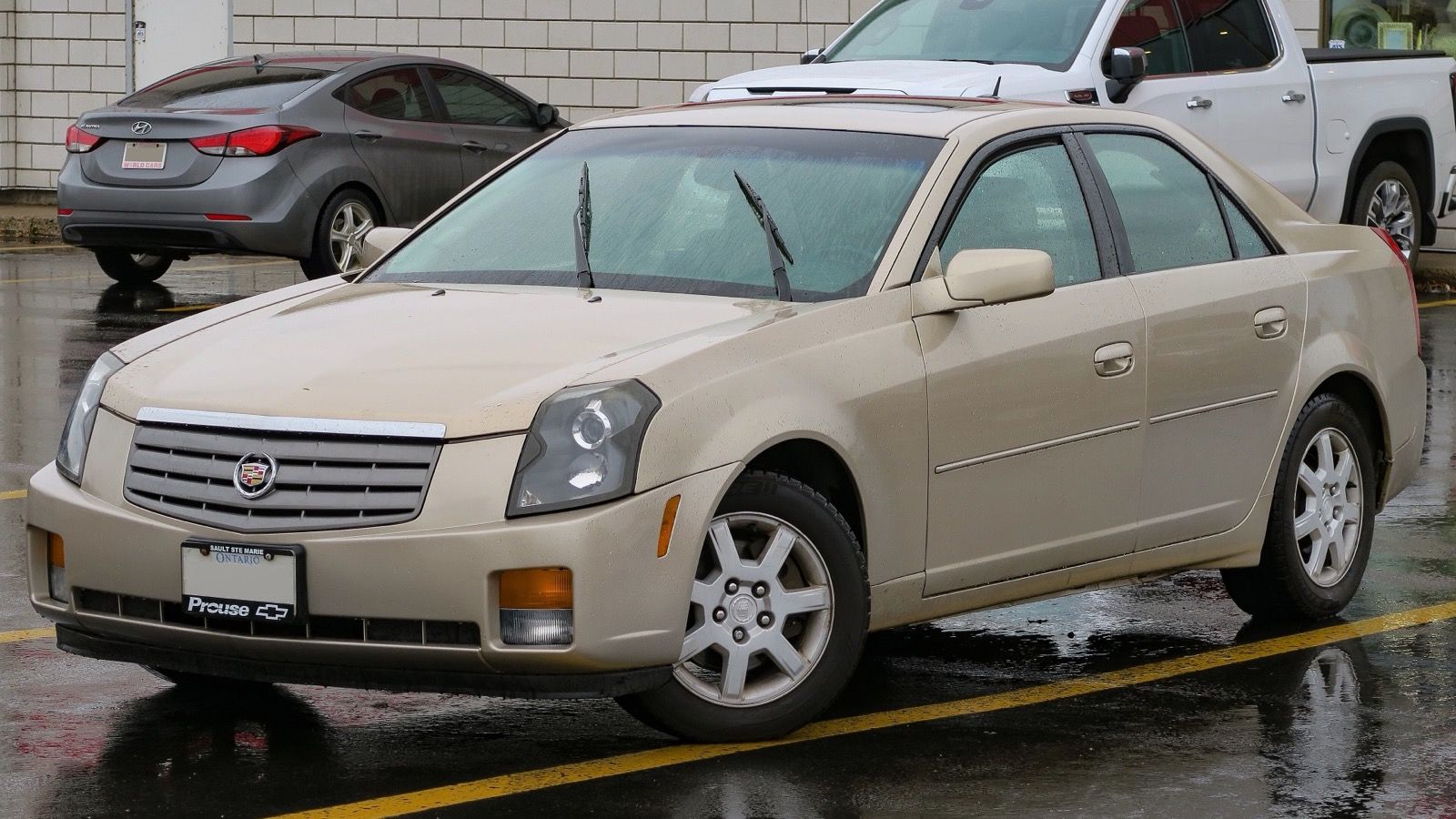 2005 Cadillac CTS in Sand Storm, front-left view