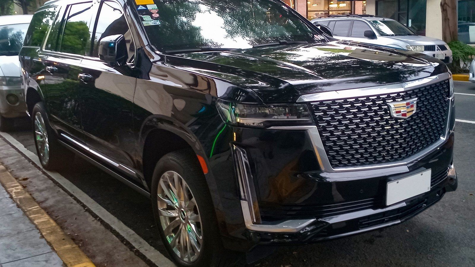 2023 Cadillac Escalade ESV (T1XX) in Black Raven, front three-quarter view