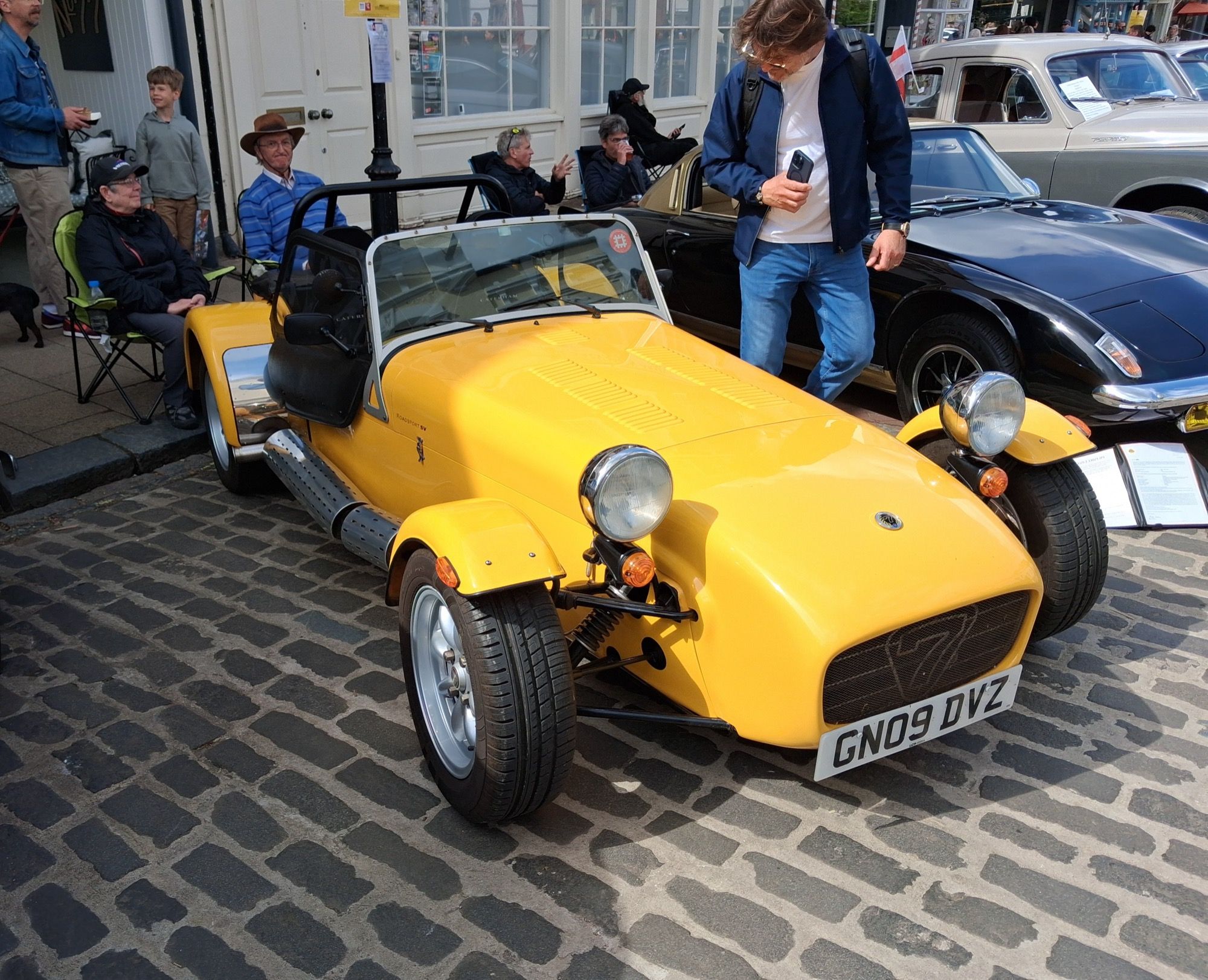 Yellow 2009 Caterham Seven Roadsport SV wide-body roadster, front three-quarter view