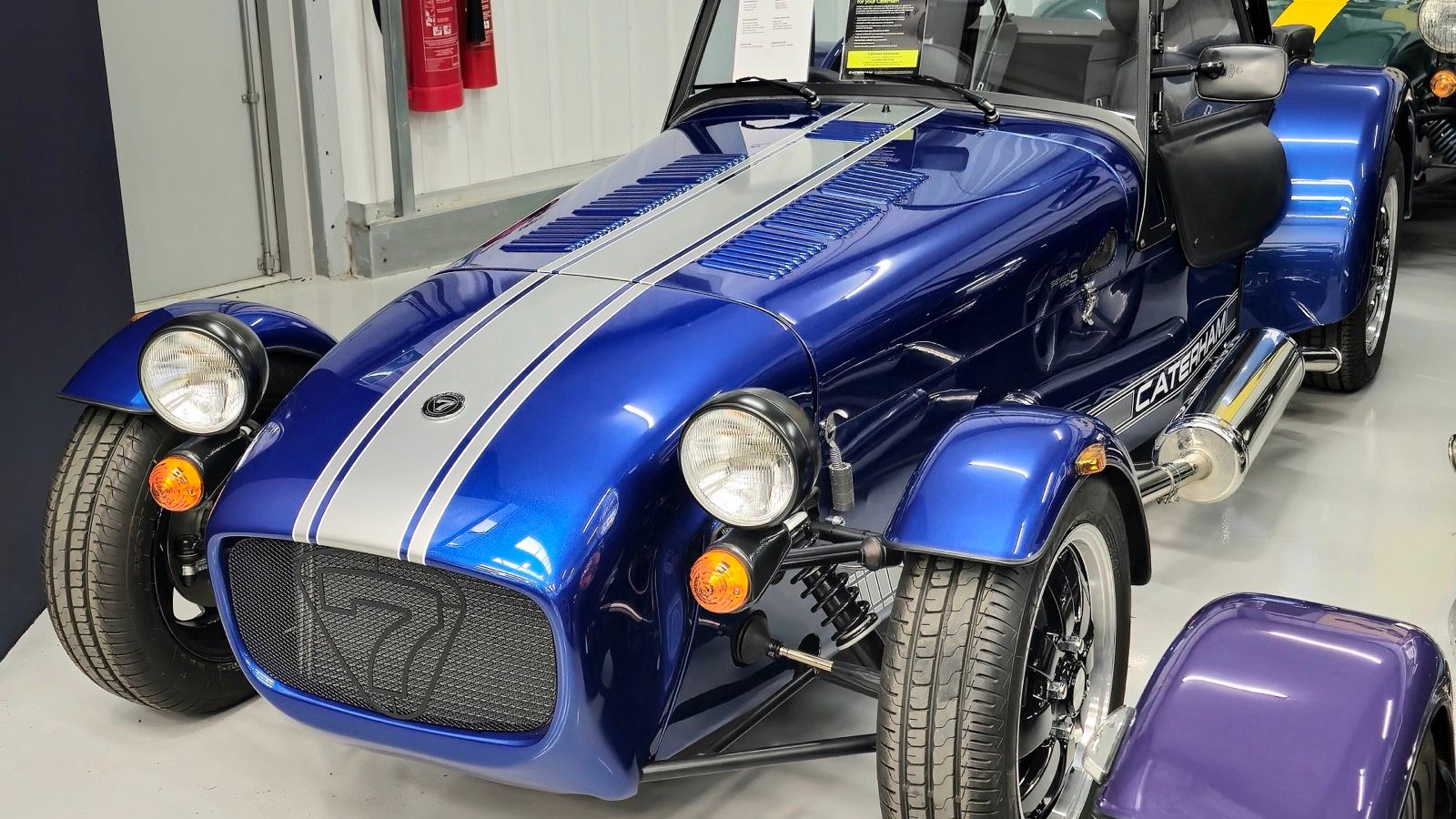 Blue 2024 Caterham Seven 170S narrow-body roadster, front three-quarter view