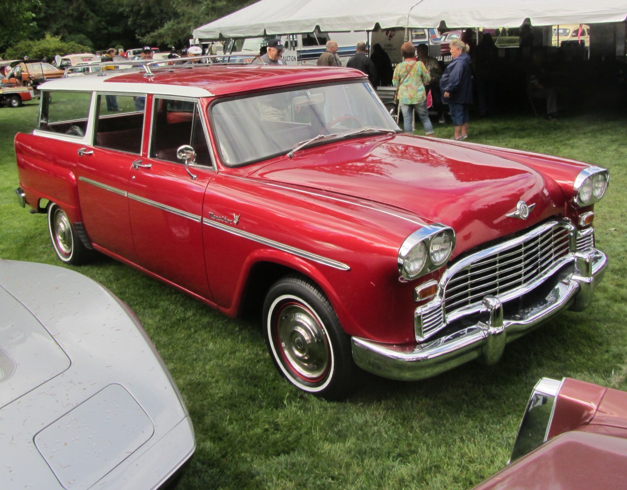 Red 1966 Checker Marathon station wagon, front three-quarter view