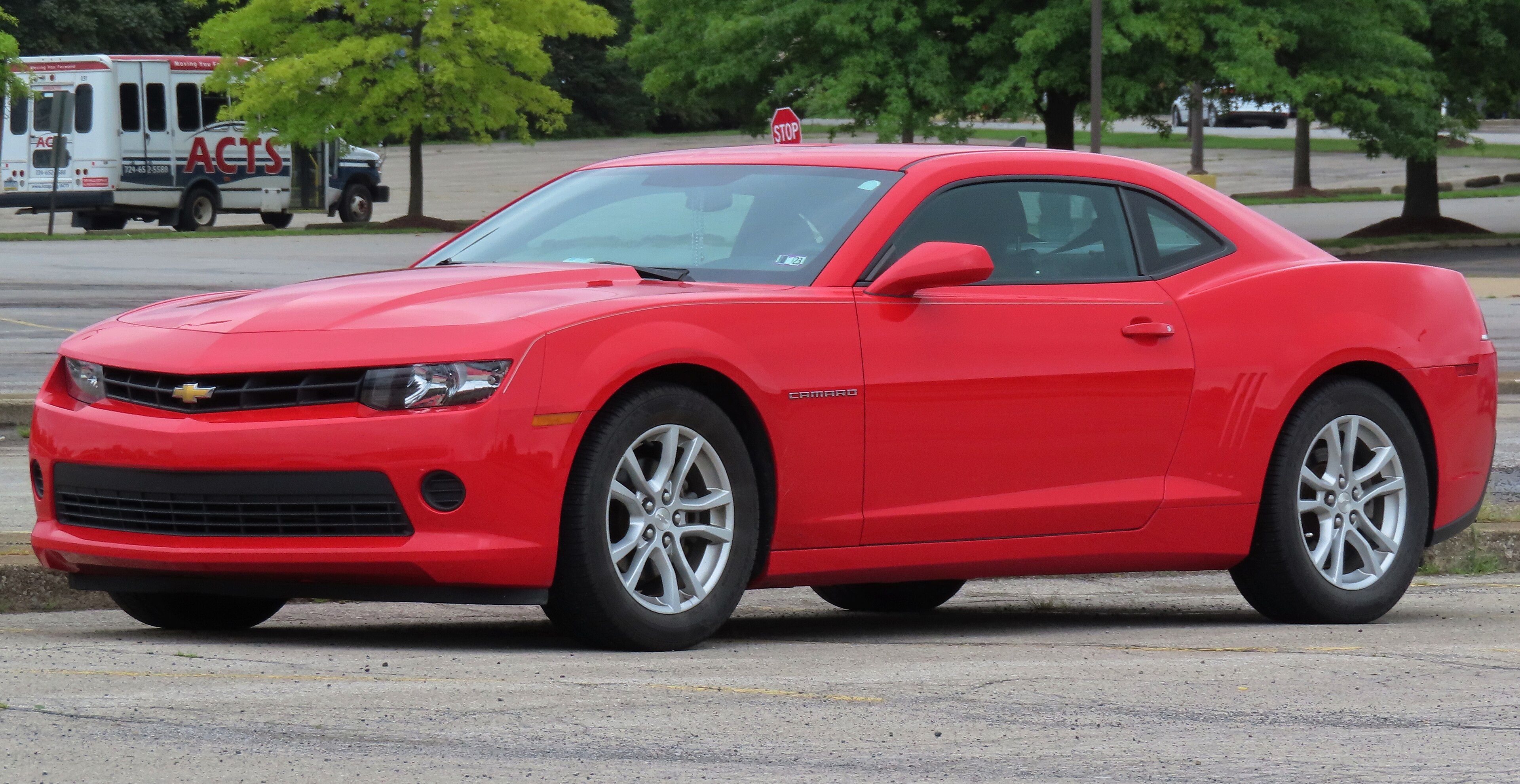 Red 2014 Chevrolet Camaro 2LS coupe, front three-quarter view