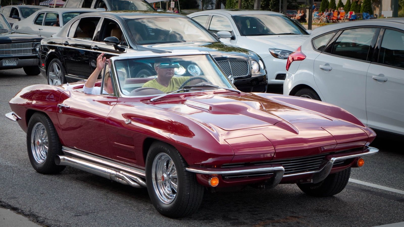 1964 Chevrolet Corvette Sting Ray, C2 second generation — maroon convertible, front three-quarter view