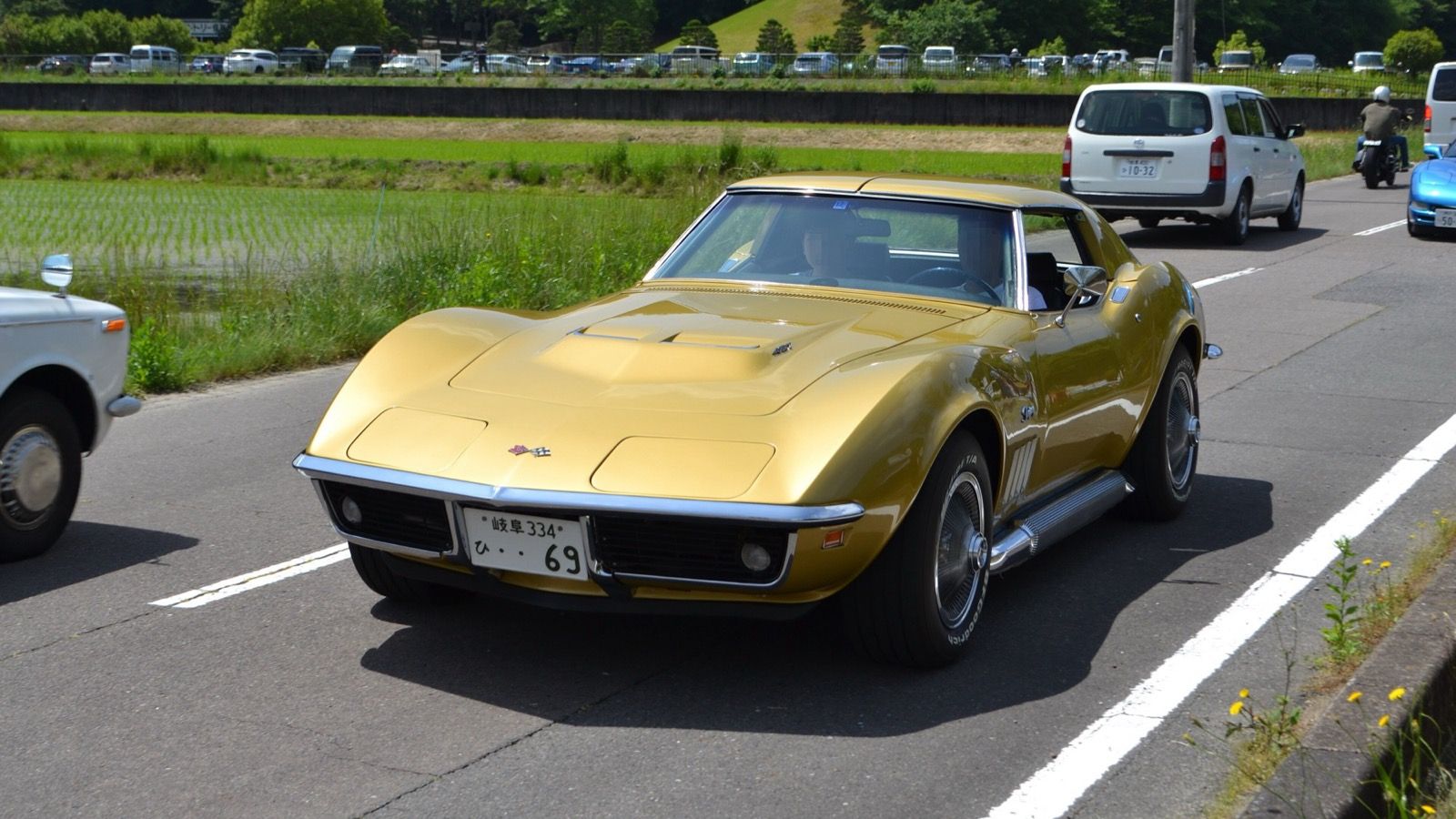 1969 Chevrolet Corvette Stingray, C3 third generation — gold coupe, front three-quarter view