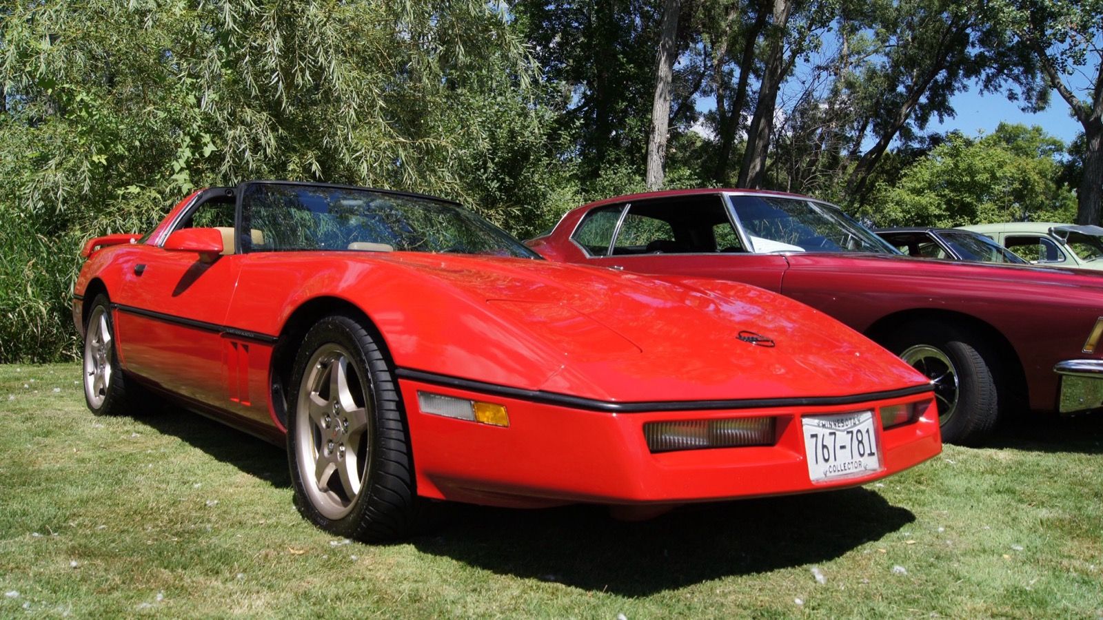 1986 Chevrolet Corvette, C4 fourth generation — red coupe, front three-quarter view