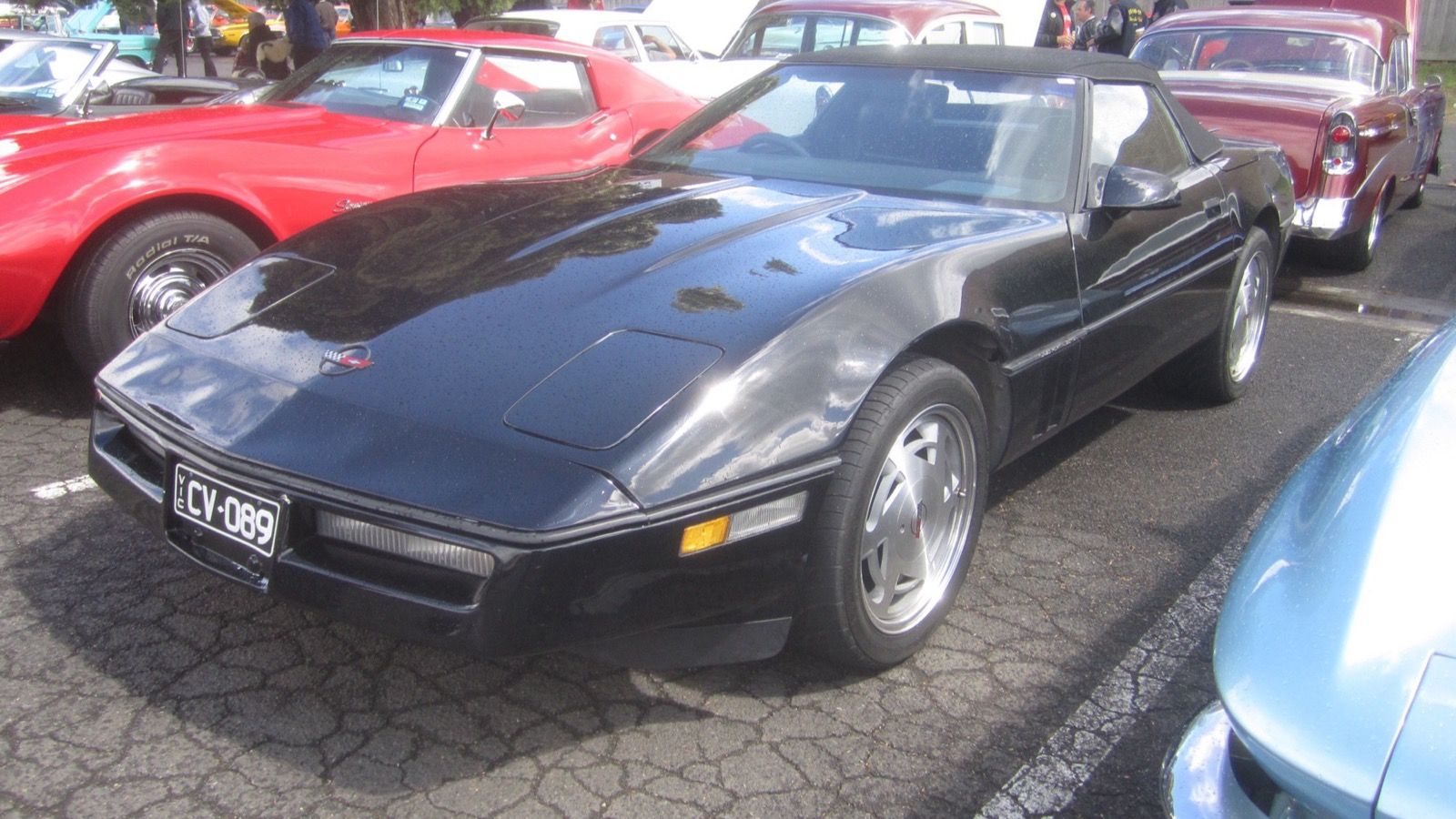 1989 Chevrolet Corvette, C4 fourth generation — black convertible, front three-quarter view