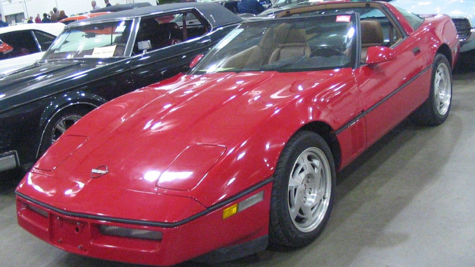 1990 Chevrolet Corvette, C4 fourth generation — red coupe, front three-quarter view