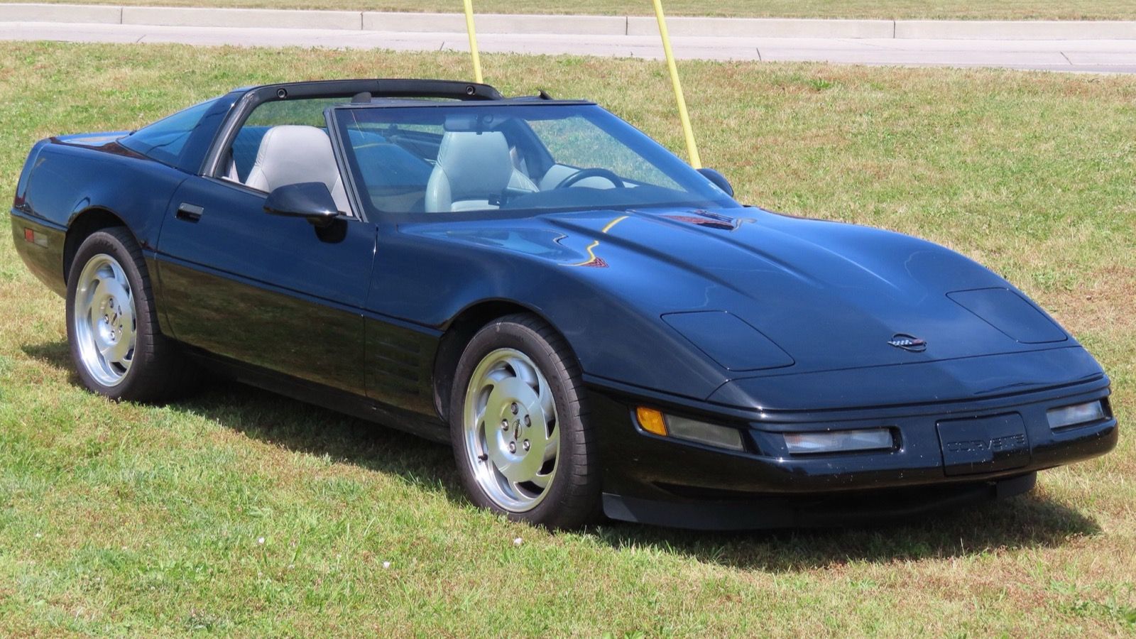 1994 Chevrolet Corvette, C4 fourth generation — black coupe, front three-quarter view