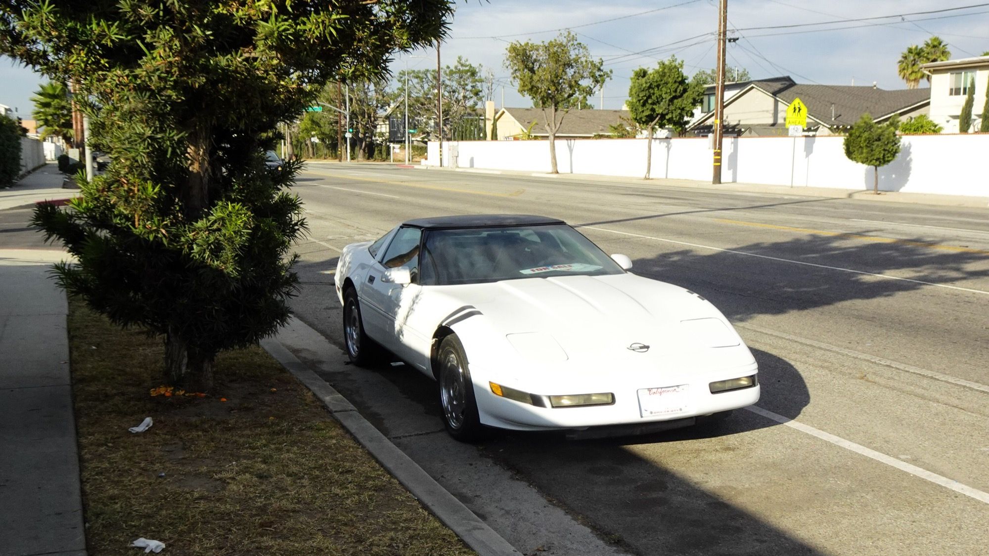 1995 Chevrolet Corvette, C4 fourth generation — white coupe, front three-quarter view