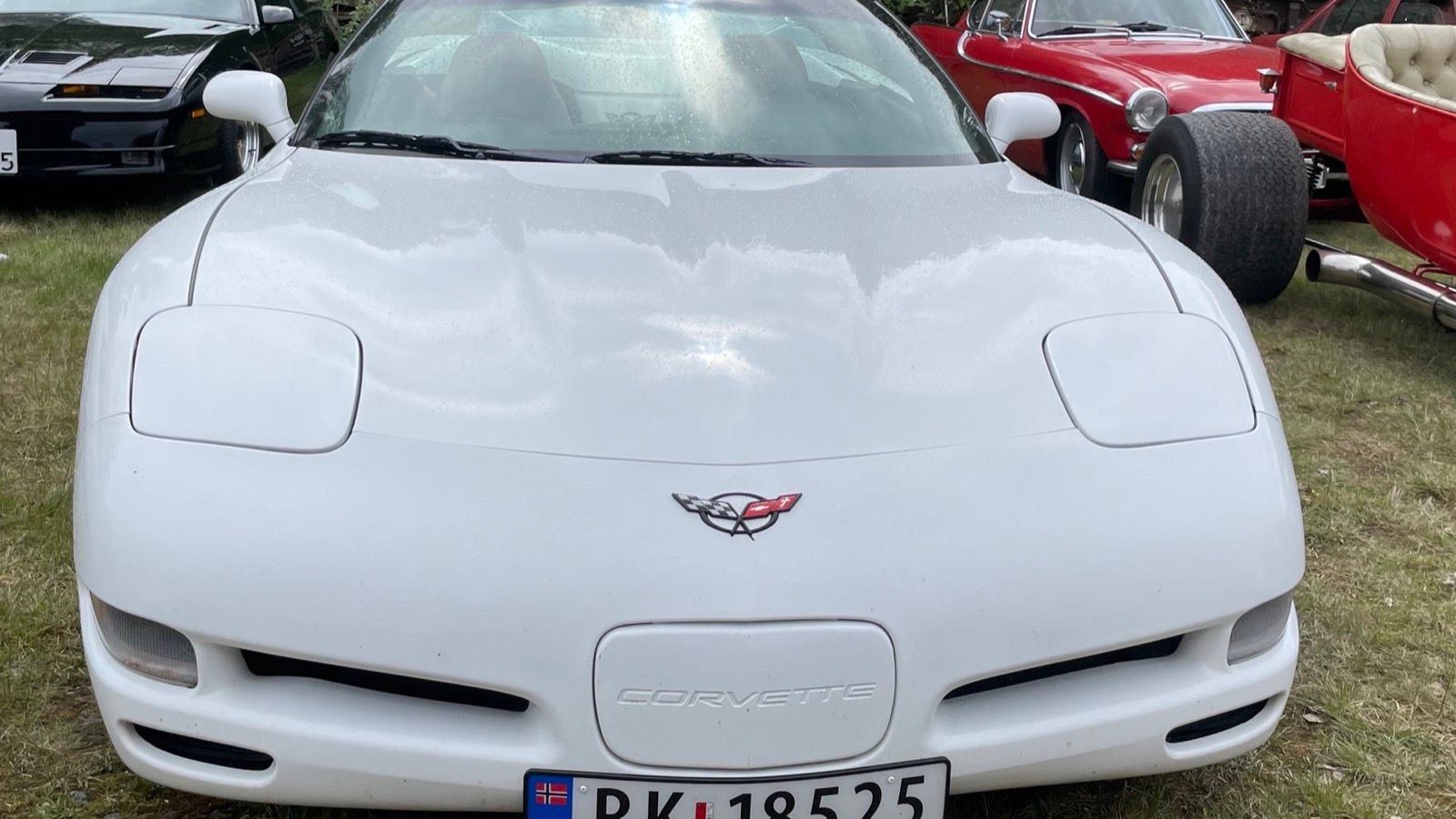 1998 Chevrolet Corvette, C5 fifth generation — white coupe, front three-quarter view