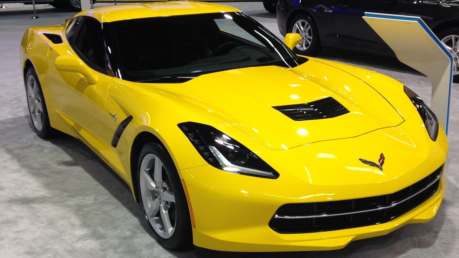 2014 Chevrolet Corvette — C7 Stingray coupe, front three-quarter view