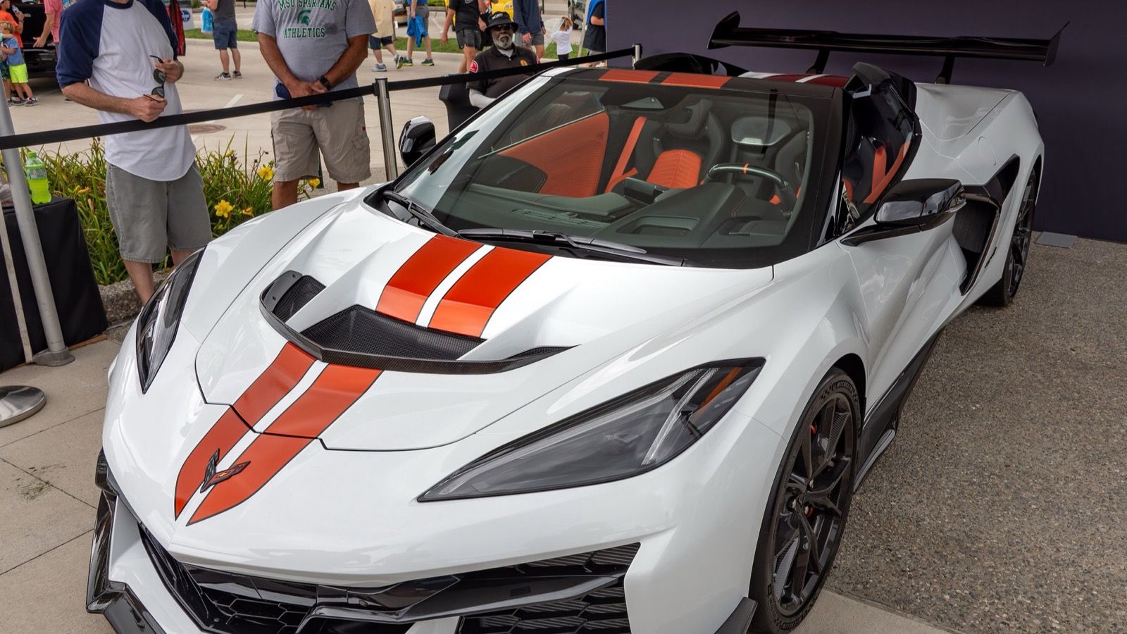 2025 Chevrolet Corvette ZR1, C8 eighth generation — white coupe with racing stripes, front three-quarter view